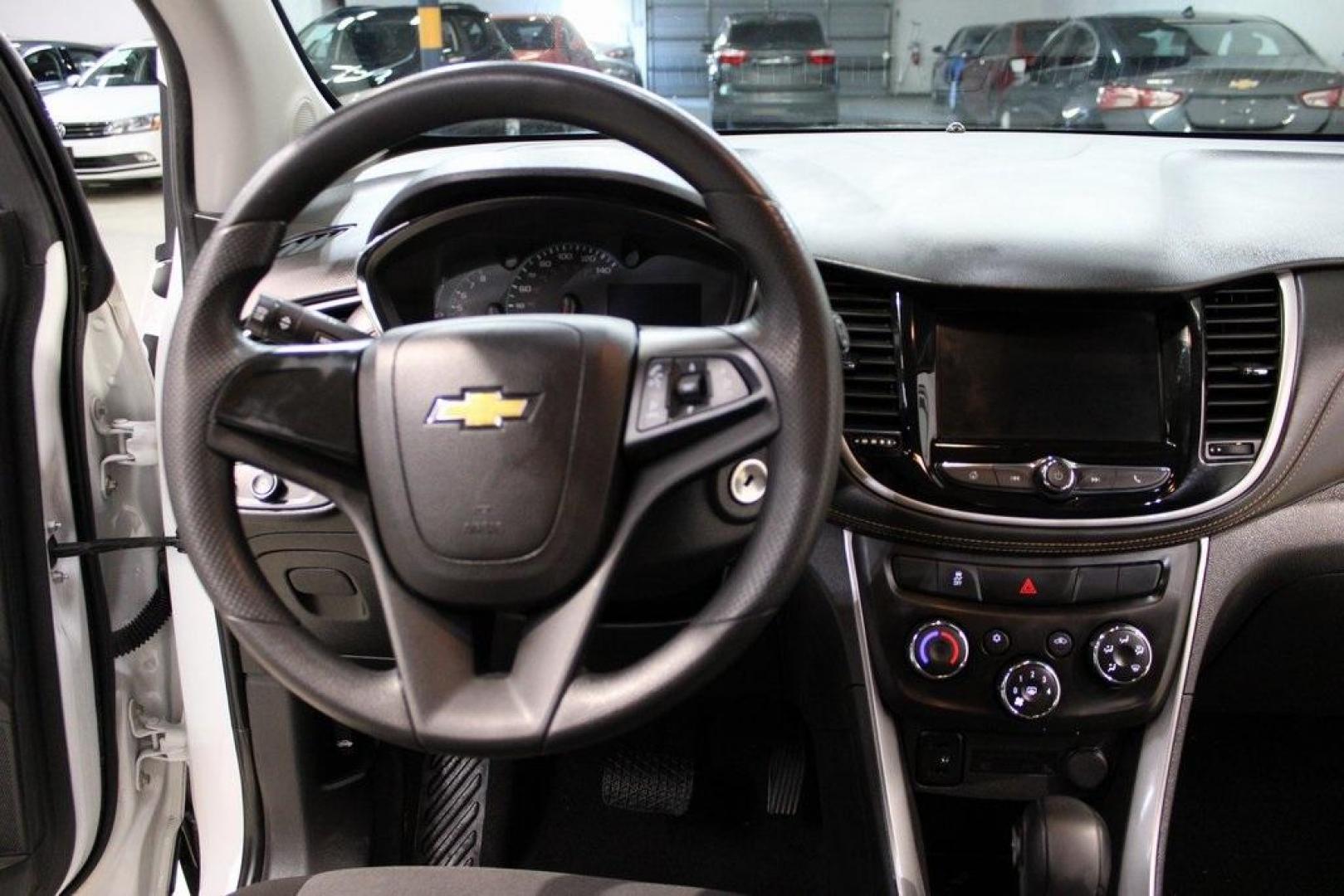 2018 Summit White /Black Chevrolet Trax LS (KL7CJNSB5JB) with an ECOTEC 1.4L I4 SMPI DOHC Turbocharged VVT engine, Automatic transmission, located at 15300 Midway Rd., Addison, TX, 75001, (972) 702-0011, 32.958321, -96.838074 - Photo#17