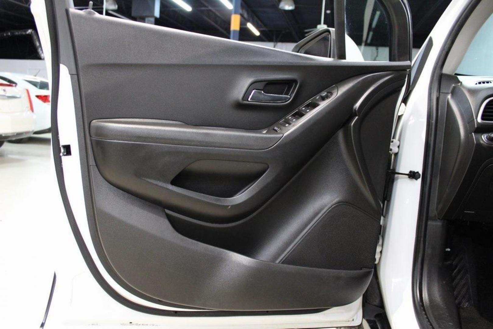2018 Summit White /Black Chevrolet Trax LS (KL7CJNSB5JB) with an ECOTEC 1.4L I4 SMPI DOHC Turbocharged VVT engine, Automatic transmission, located at 15300 Midway Rd., Addison, TX, 75001, (972) 702-0011, 32.958321, -96.838074 - Photo#24