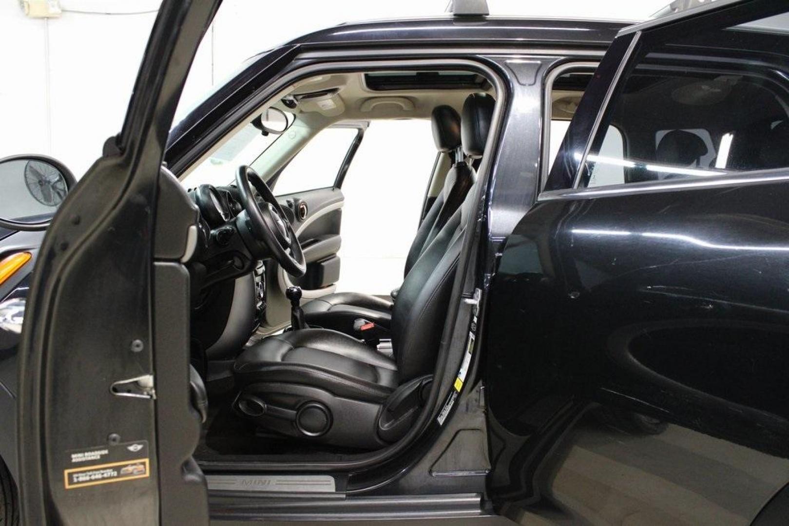2015 Black Metallic /Carbon Black MINI Cooper Countryman Base (WMWZB3C55FW) with an 1.6L I4 DOHC 16V engine, Manual transmission, located at 15300 Midway Rd., Addison, TX, 75001, (972) 702-0011, 32.958321, -96.838074 - Photo#13