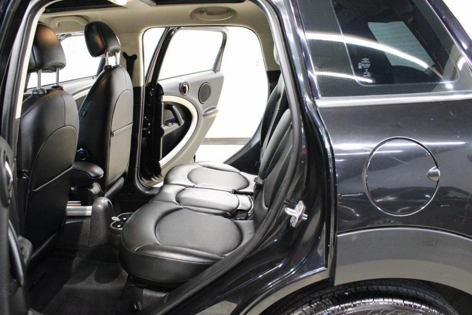 2015 Black Metallic /Carbon Black MINI Cooper Countryman Base (WMWZB3C55FW) with an 1.6L I4 DOHC 16V engine, Manual transmission, located at 15300 Midway Rd., Addison, TX, 75001, (972) 702-0011, 32.958321, -96.838074 - Photo#16