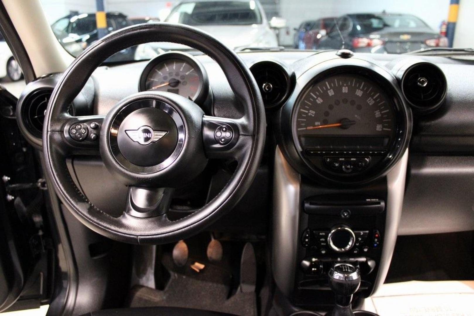 2015 Black Metallic /Carbon Black MINI Cooper Countryman Base (WMWZB3C55FW) with an 1.6L I4 DOHC 16V engine, Manual transmission, located at 15300 Midway Rd., Addison, TX, 75001, (972) 702-0011, 32.958321, -96.838074 - Photo#17