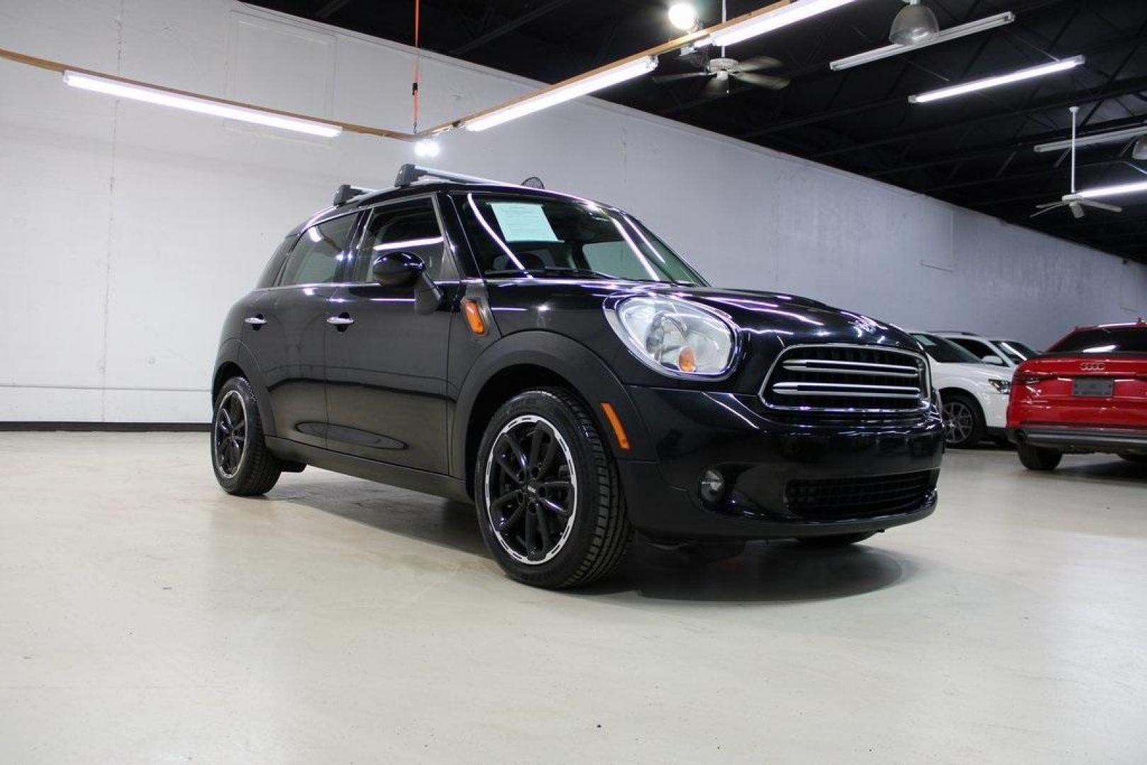 2015 Black Metallic /Carbon Black MINI Cooper Countryman Base (WMWZB3C55FW) with an 1.6L I4 DOHC 16V engine, Manual transmission, located at 15300 Midway Rd., Addison, TX, 75001, (972) 702-0011, 32.958321, -96.838074 - Photo#1