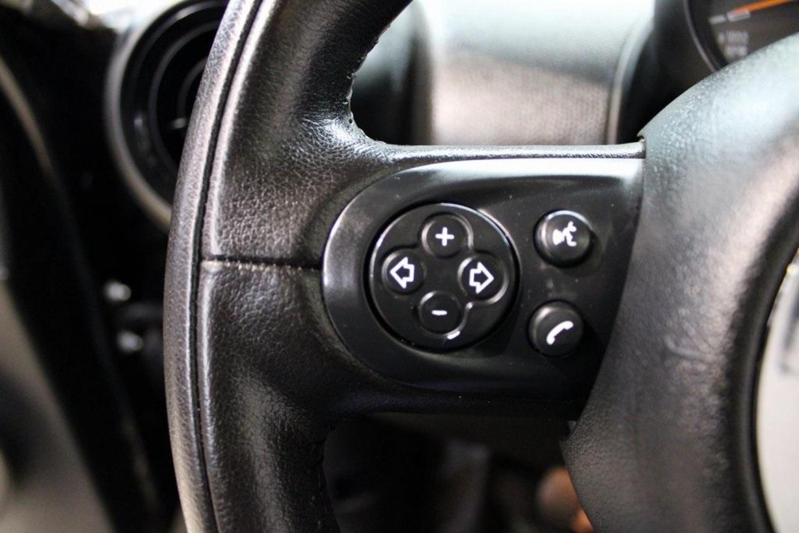2015 Black Metallic /Carbon Black MINI Cooper Countryman Base (WMWZB3C55FW) with an 1.6L I4 DOHC 16V engine, Manual transmission, located at 15300 Midway Rd., Addison, TX, 75001, (972) 702-0011, 32.958321, -96.838074 - Photo#21