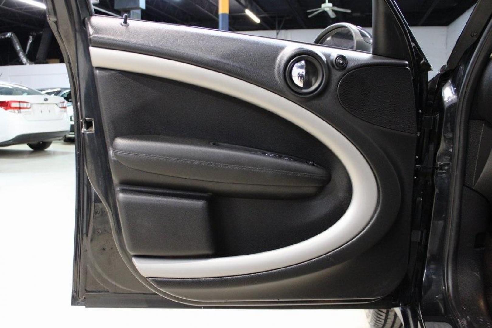 2015 Black Metallic /Carbon Black MINI Cooper Countryman Base (WMWZB3C55FW) with an 1.6L I4 DOHC 16V engine, Manual transmission, located at 15300 Midway Rd., Addison, TX, 75001, (972) 702-0011, 32.958321, -96.838074 - Photo#24