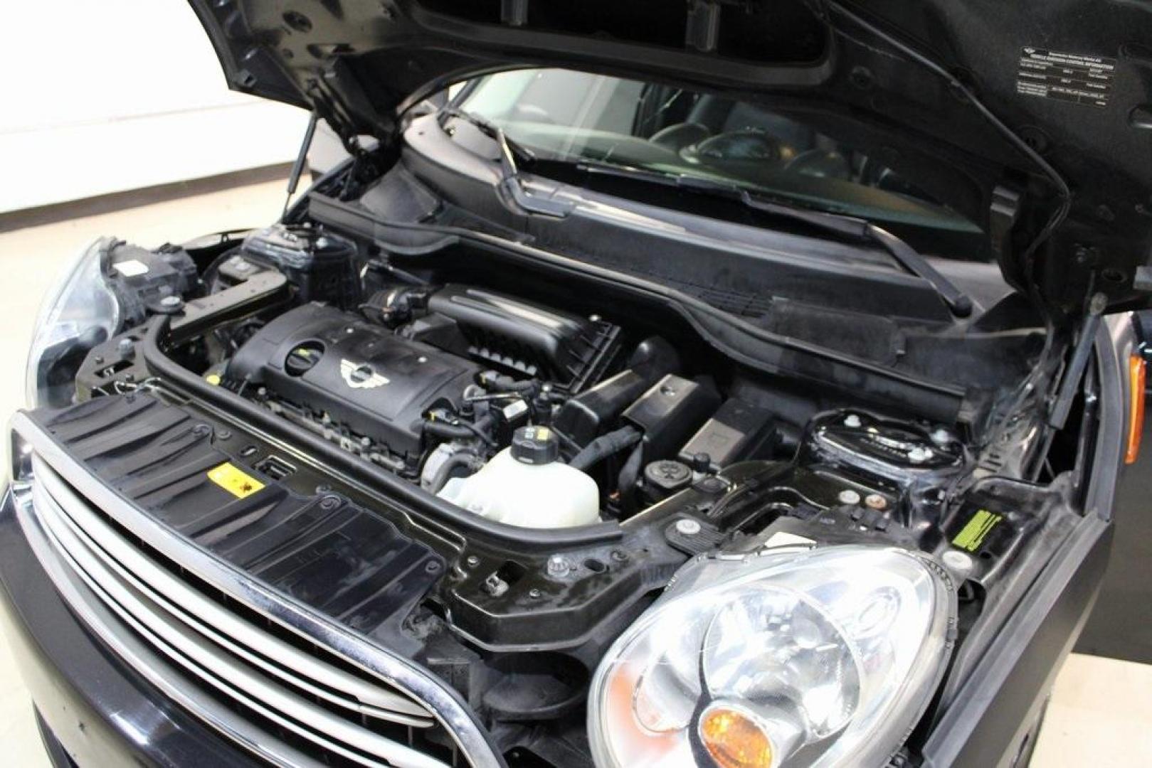 2015 Black Metallic /Carbon Black MINI Cooper Countryman Base (WMWZB3C55FW) with an 1.6L I4 DOHC 16V engine, Manual transmission, located at 15300 Midway Rd., Addison, TX, 75001, (972) 702-0011, 32.958321, -96.838074 - Photo#27