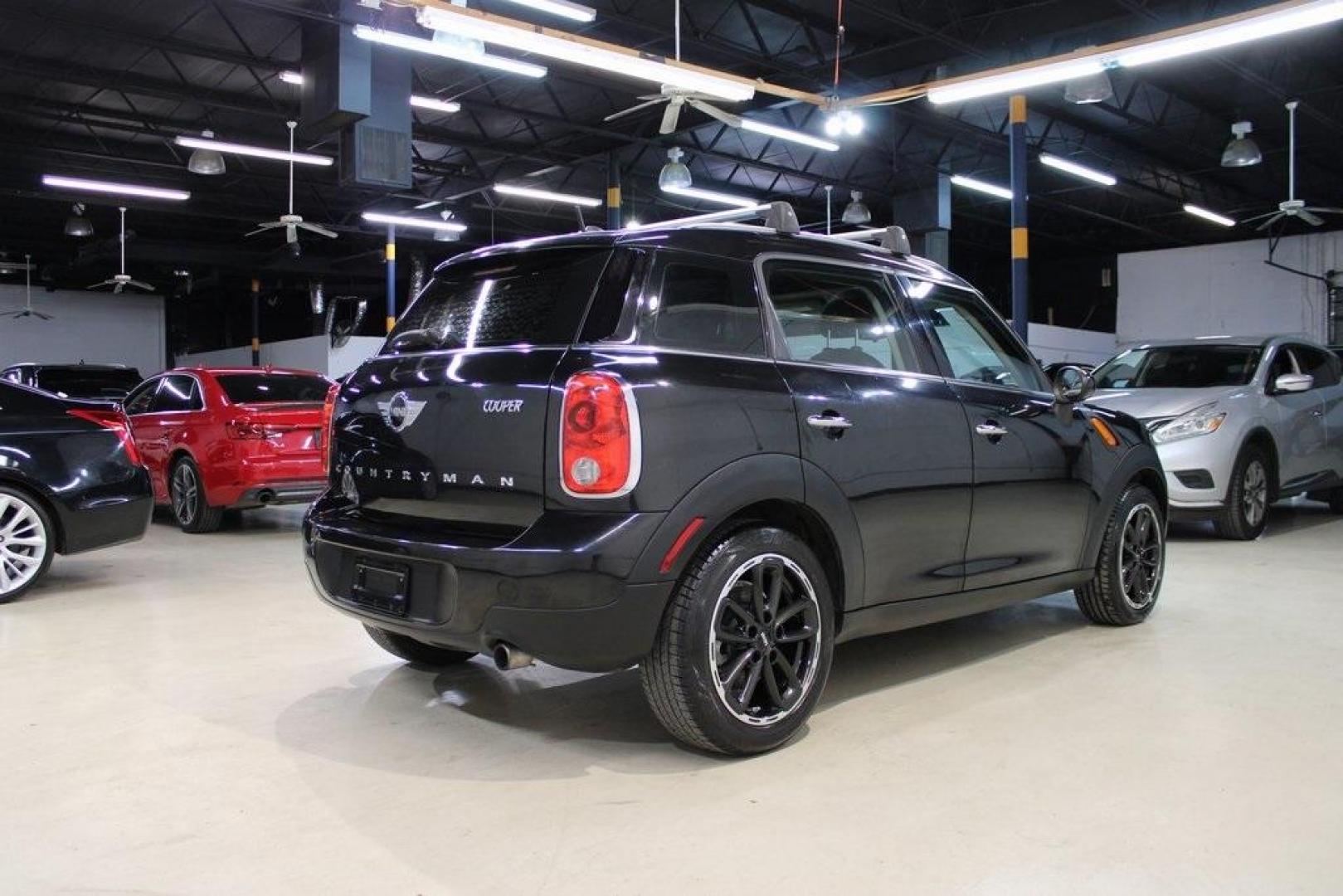 2015 Black Metallic /Carbon Black MINI Cooper Countryman Base (WMWZB3C55FW) with an 1.6L I4 DOHC 16V engine, Manual transmission, located at 15300 Midway Rd., Addison, TX, 75001, (972) 702-0011, 32.958321, -96.838074 - Photo#2