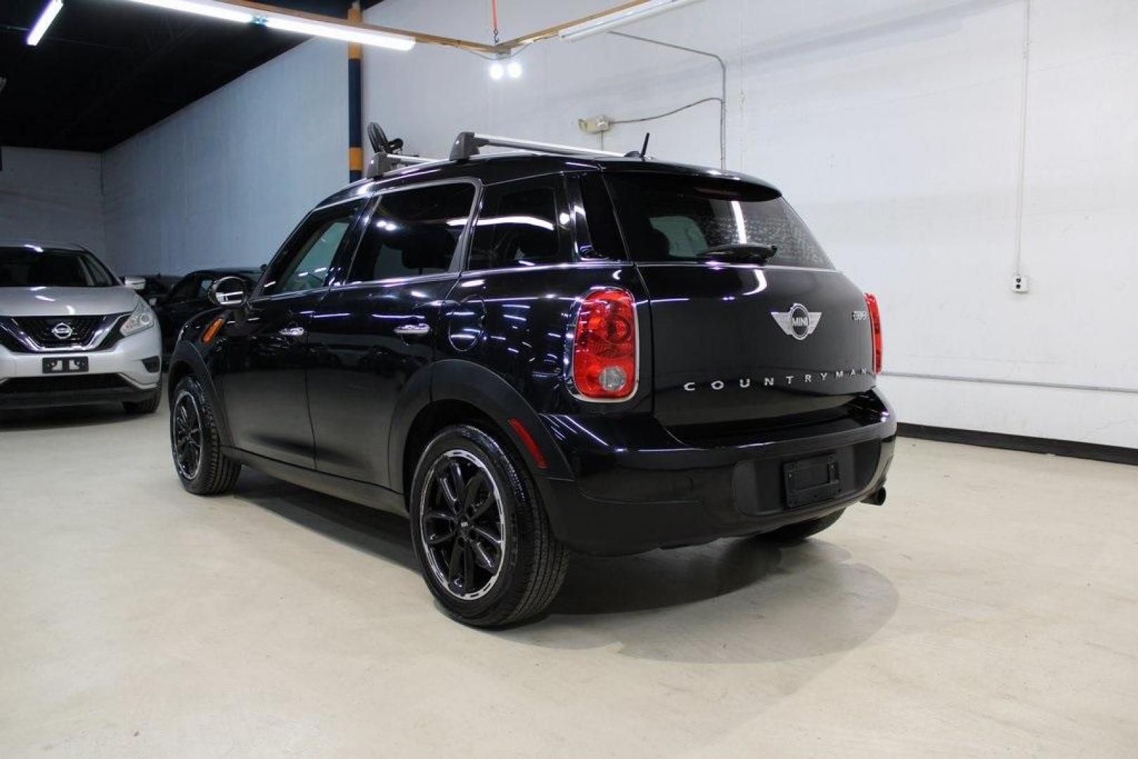 2015 Black Metallic /Carbon Black MINI Cooper Countryman Base (WMWZB3C55FW) with an 1.6L I4 DOHC 16V engine, Manual transmission, located at 15300 Midway Rd., Addison, TX, 75001, (972) 702-0011, 32.958321, -96.838074 - Photo#3