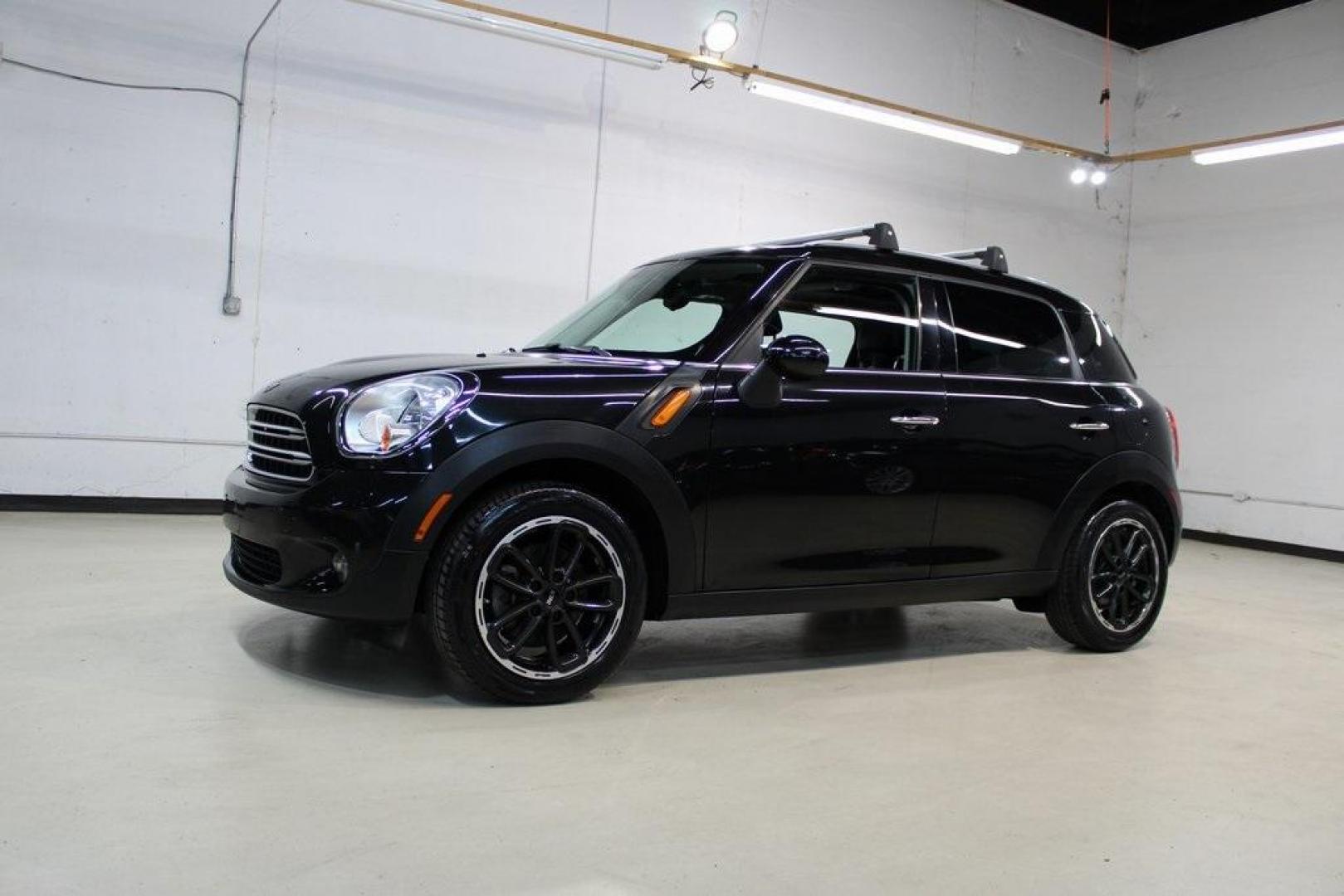 2015 Black Metallic /Carbon Black MINI Cooper Countryman Base (WMWZB3C55FW) with an 1.6L I4 DOHC 16V engine, Manual transmission, located at 15300 Midway Rd., Addison, TX, 75001, (972) 702-0011, 32.958321, -96.838074 - Photo#4