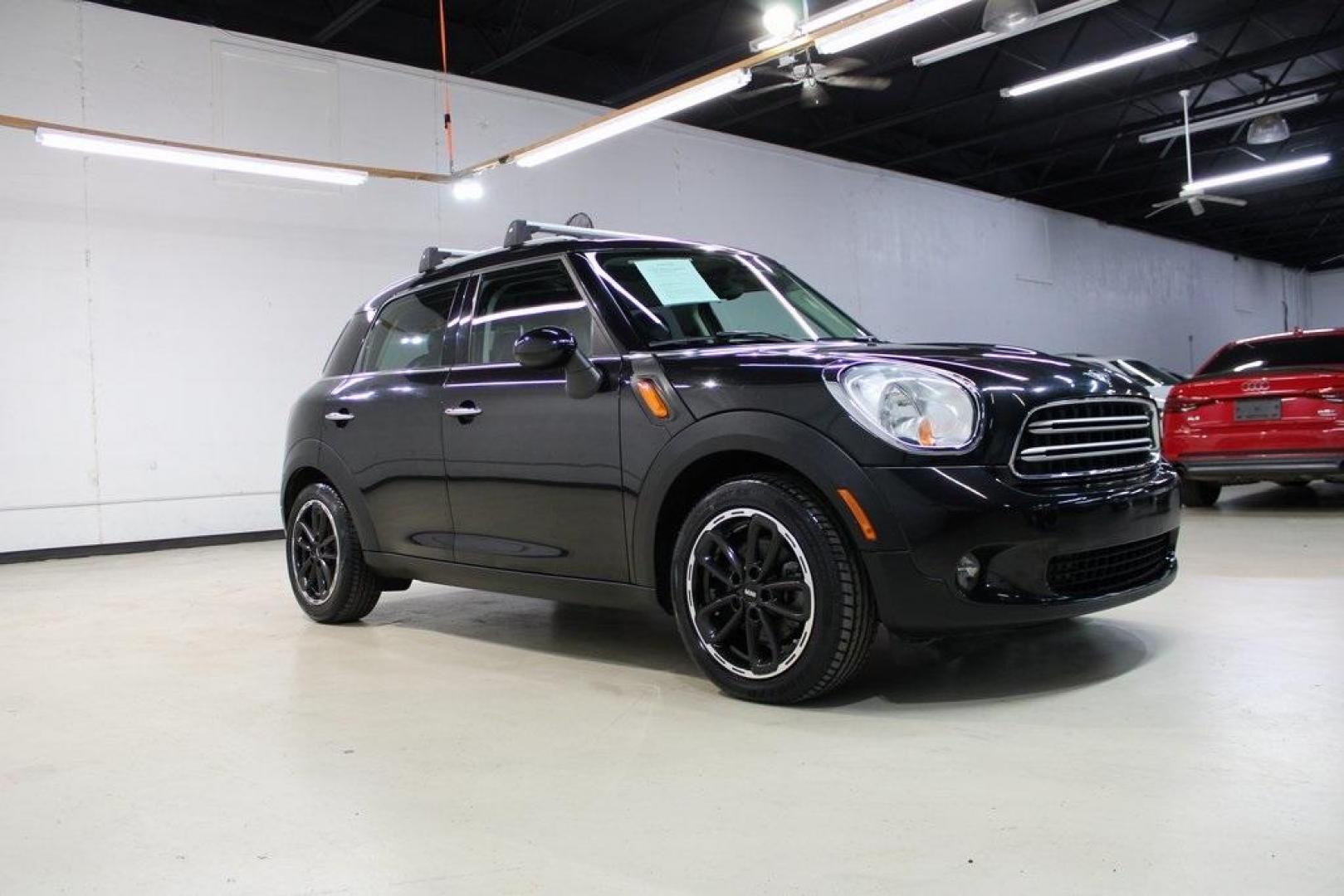 2015 Black Metallic /Carbon Black MINI Cooper Countryman Base (WMWZB3C55FW) with an 1.6L I4 DOHC 16V engine, Manual transmission, located at 15300 Midway Rd., Addison, TX, 75001, (972) 702-0011, 32.958321, -96.838074 - Photo#6