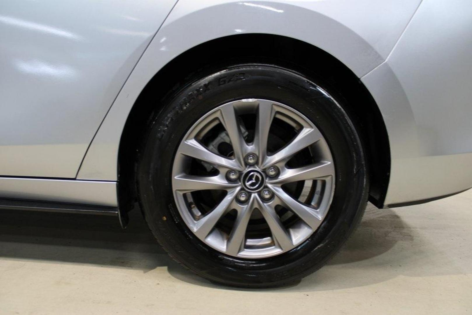 2021 Sonic Silver Metallic /Black Mazda Mazda3 2.0 (3MZBPAA73MM) with an I4 engine, Automatic transmission, located at 15300 Midway Rd., Addison, TX, 75001, (972) 702-0011, 32.958321, -96.838074 - Introducing the 2021 Mazda3 2.5 S Sedan, now available at Midway Auto Group in Addison, Texas. This compact sedan seamlessly blends performance, efficiency, and advanced technology, offering a driving experience that's both exhilarating and practical.<br><br>Key Features:<br><br>Engine: 2.5-liter Sk - Photo#9