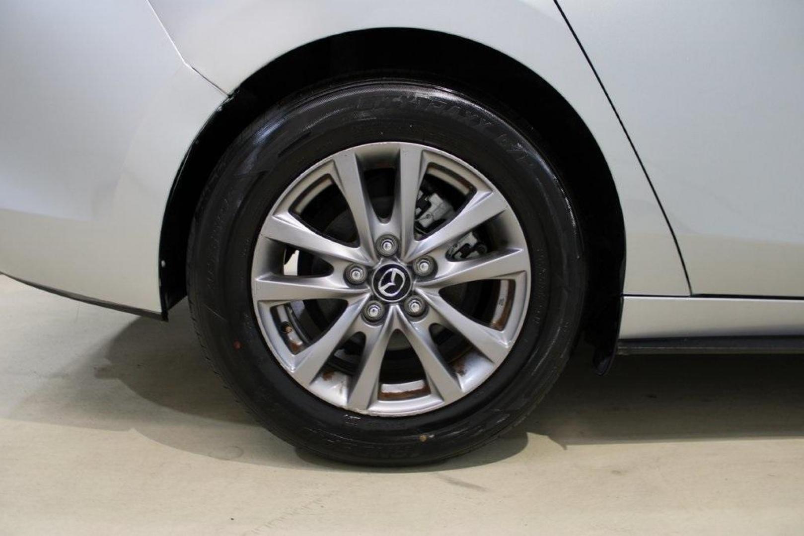 2021 Sonic Silver Metallic /Black Mazda Mazda3 2.0 (3MZBPAA73MM) with an I4 engine, Automatic transmission, located at 15300 Midway Rd., Addison, TX, 75001, (972) 702-0011, 32.958321, -96.838074 - Introducing the 2021 Mazda3 2.5 S Sedan, now available at Midway Auto Group in Addison, Texas. This compact sedan seamlessly blends performance, efficiency, and advanced technology, offering a driving experience that's both exhilarating and practical.<br><br>Key Features:<br><br>Engine: 2.5-liter Sk - Photo#10