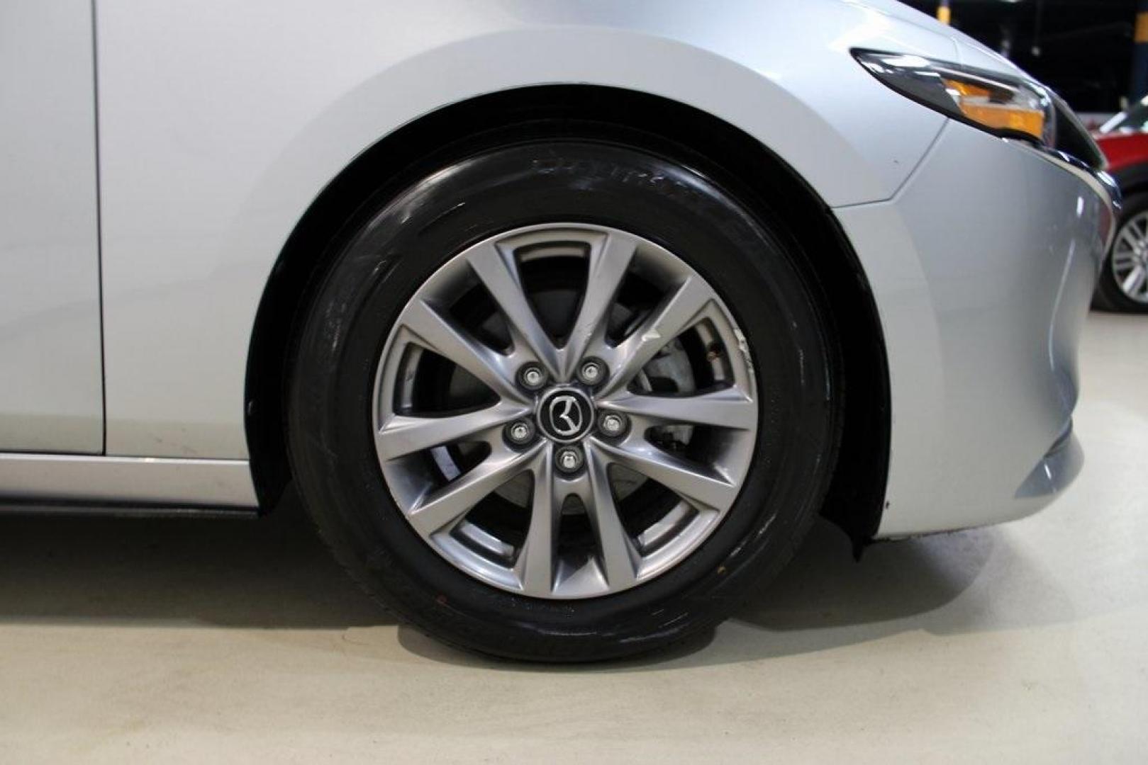 2021 Sonic Silver Metallic /Black Mazda Mazda3 2.0 (3MZBPAA73MM) with an I4 engine, Automatic transmission, located at 15300 Midway Rd., Addison, TX, 75001, (972) 702-0011, 32.958321, -96.838074 - Introducing the 2021 Mazda3 2.5 S Sedan, now available at Midway Auto Group in Addison, Texas. This compact sedan seamlessly blends performance, efficiency, and advanced technology, offering a driving experience that's both exhilarating and practical.<br><br>Key Features:<br><br>Engine: 2.5-liter Sk - Photo#11