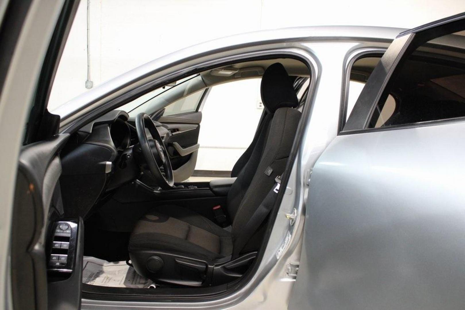 2021 Sonic Silver Metallic /Black Mazda Mazda3 2.0 (3MZBPAA73MM) with an I4 engine, Automatic transmission, located at 15300 Midway Rd., Addison, TX, 75001, (972) 702-0011, 32.958321, -96.838074 - Introducing the 2021 Mazda3 2.5 S Sedan, now available at Midway Auto Group in Addison, Texas. This compact sedan seamlessly blends performance, efficiency, and advanced technology, offering a driving experience that's both exhilarating and practical.<br><br>Key Features:<br><br>Engine: 2.5-liter Sk - Photo#13