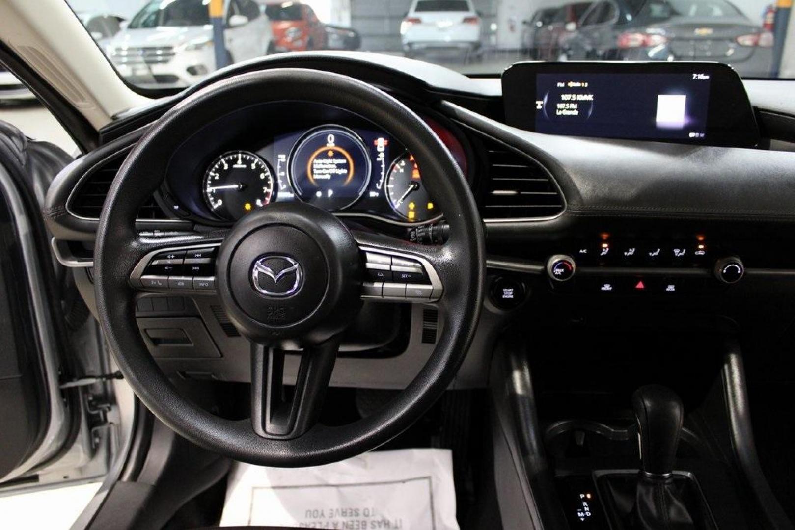 2021 Sonic Silver Metallic /Black Mazda Mazda3 2.0 (3MZBPAA73MM) with an I4 engine, Automatic transmission, located at 15300 Midway Rd., Addison, TX, 75001, (972) 702-0011, 32.958321, -96.838074 - Introducing the 2021 Mazda3 2.5 S Sedan, now available at Midway Auto Group in Addison, Texas. This compact sedan seamlessly blends performance, efficiency, and advanced technology, offering a driving experience that's both exhilarating and practical.<br><br>Key Features:<br><br>Engine: 2.5-liter Sk - Photo#17
