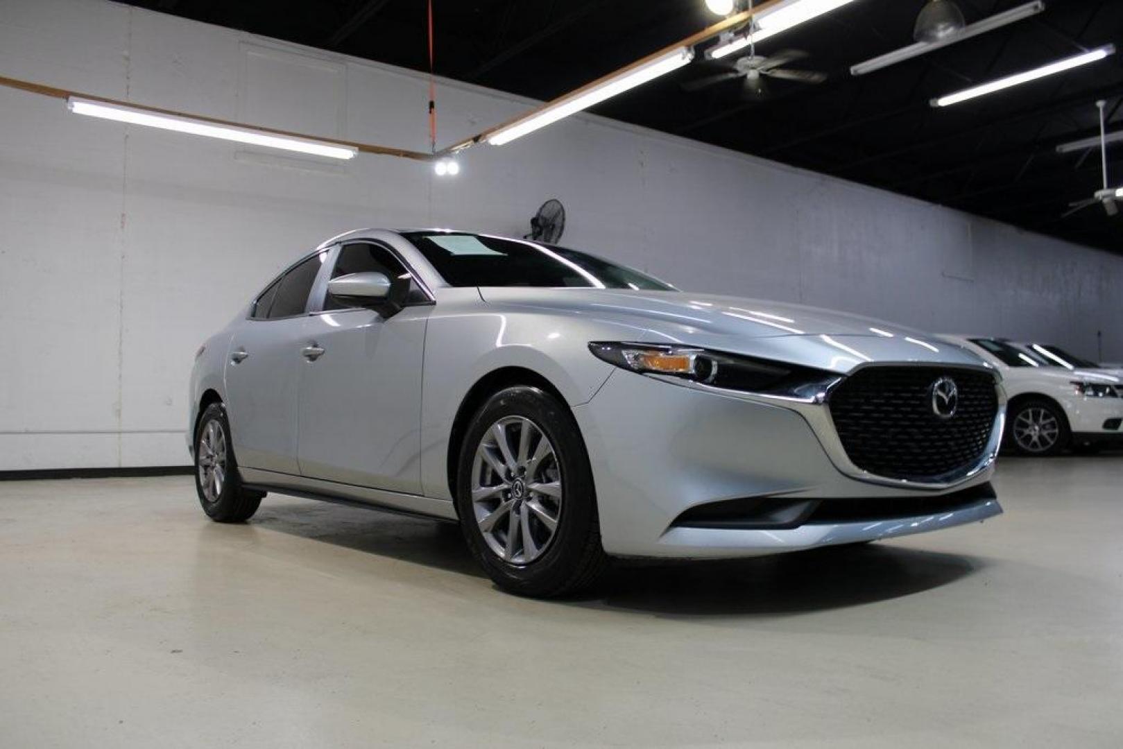 2021 Sonic Silver Metallic /Black Mazda Mazda3 2.0 (3MZBPAA73MM) with an I4 engine, Automatic transmission, located at 15300 Midway Rd., Addison, TX, 75001, (972) 702-0011, 32.958321, -96.838074 - Introducing the 2021 Mazda3 2.5 S Sedan, now available at Midway Auto Group in Addison, Texas. This compact sedan seamlessly blends performance, efficiency, and advanced technology, offering a driving experience that's both exhilarating and practical.<br><br>Key Features:<br><br>Engine: 2.5-liter Sk - Photo#1