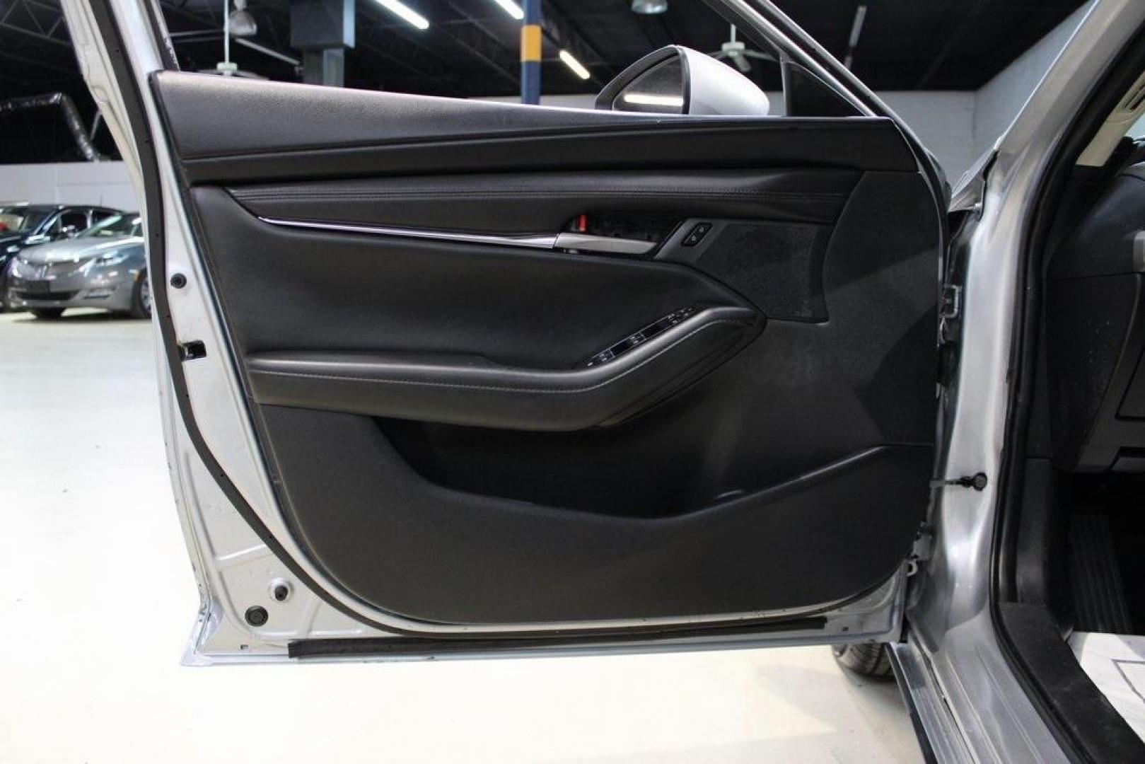 2021 Sonic Silver Metallic /Black Mazda Mazda3 2.0 (3MZBPAA73MM) with an I4 engine, Automatic transmission, located at 15300 Midway Rd., Addison, TX, 75001, (972) 702-0011, 32.958321, -96.838074 - Introducing the 2021 Mazda3 2.5 S Sedan, now available at Midway Auto Group in Addison, Texas. This compact sedan seamlessly blends performance, efficiency, and advanced technology, offering a driving experience that's both exhilarating and practical.<br><br>Key Features:<br><br>Engine: 2.5-liter Sk - Photo#26