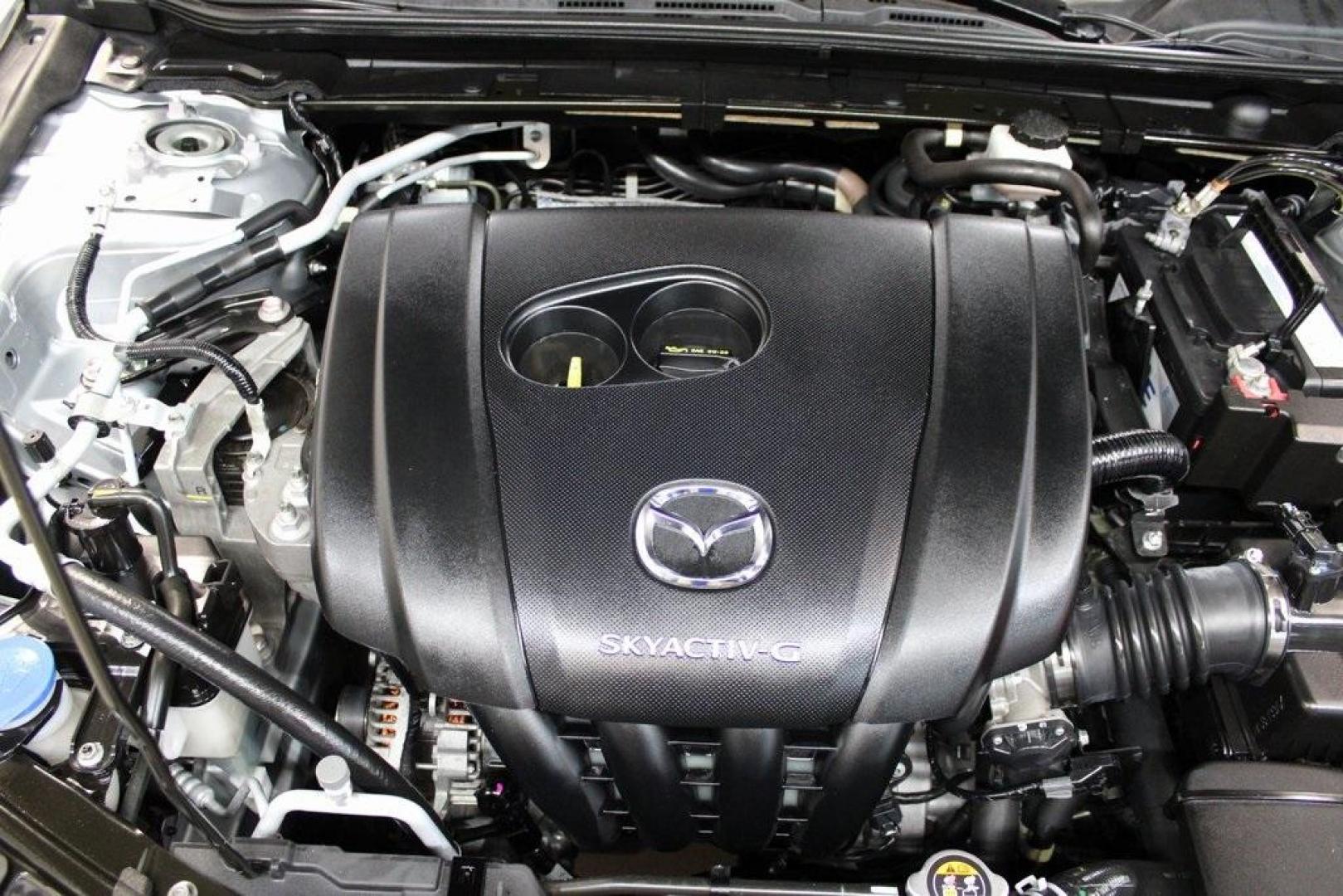 2021 Sonic Silver Metallic /Black Mazda Mazda3 2.0 (3MZBPAA73MM) with an I4 engine, Automatic transmission, located at 15300 Midway Rd., Addison, TX, 75001, (972) 702-0011, 32.958321, -96.838074 - Introducing the 2021 Mazda3 2.5 S Sedan, now available at Midway Auto Group in Addison, Texas. This compact sedan seamlessly blends performance, efficiency, and advanced technology, offering a driving experience that's both exhilarating and practical.<br><br>Key Features:<br><br>Engine: 2.5-liter Sk - Photo#28