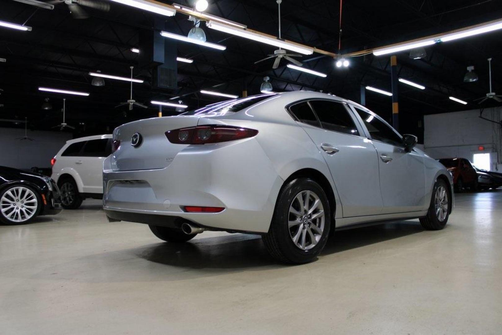 2021 Sonic Silver Metallic /Black Mazda Mazda3 2.0 (3MZBPAA73MM) with an I4 engine, Automatic transmission, located at 15300 Midway Rd., Addison, TX, 75001, (972) 702-0011, 32.958321, -96.838074 - Introducing the 2021 Mazda3 2.5 S Sedan, now available at Midway Auto Group in Addison, Texas. This compact sedan seamlessly blends performance, efficiency, and advanced technology, offering a driving experience that's both exhilarating and practical.<br><br>Key Features:<br><br>Engine: 2.5-liter Sk - Photo#2