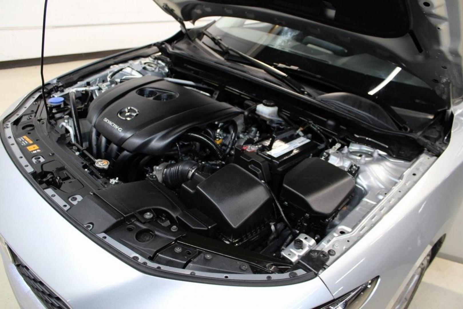 2021 Sonic Silver Metallic /Black Mazda Mazda3 2.0 (3MZBPAA73MM) with an I4 engine, Automatic transmission, located at 15300 Midway Rd., Addison, TX, 75001, (972) 702-0011, 32.958321, -96.838074 - Introducing the 2021 Mazda3 2.5 S Sedan, now available at Midway Auto Group in Addison, Texas. This compact sedan seamlessly blends performance, efficiency, and advanced technology, offering a driving experience that's both exhilarating and practical.<br><br>Key Features:<br><br>Engine: 2.5-liter Sk - Photo#29