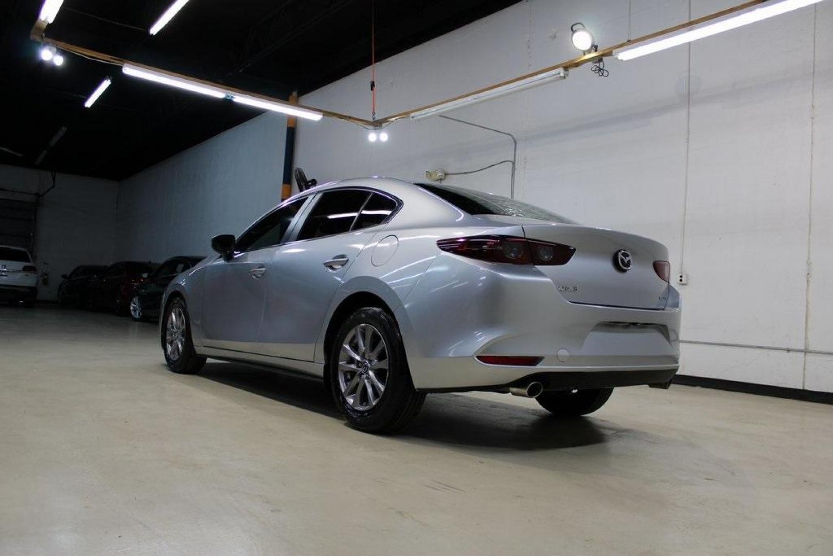 2021 Sonic Silver Metallic /Black Mazda Mazda3 2.0 (3MZBPAA73MM) with an I4 engine, Automatic transmission, located at 15300 Midway Rd., Addison, TX, 75001, (972) 702-0011, 32.958321, -96.838074 - Introducing the 2021 Mazda3 2.5 S Sedan, now available at Midway Auto Group in Addison, Texas. This compact sedan seamlessly blends performance, efficiency, and advanced technology, offering a driving experience that's both exhilarating and practical.<br><br>Key Features:<br><br>Engine: 2.5-liter Sk - Photo#3