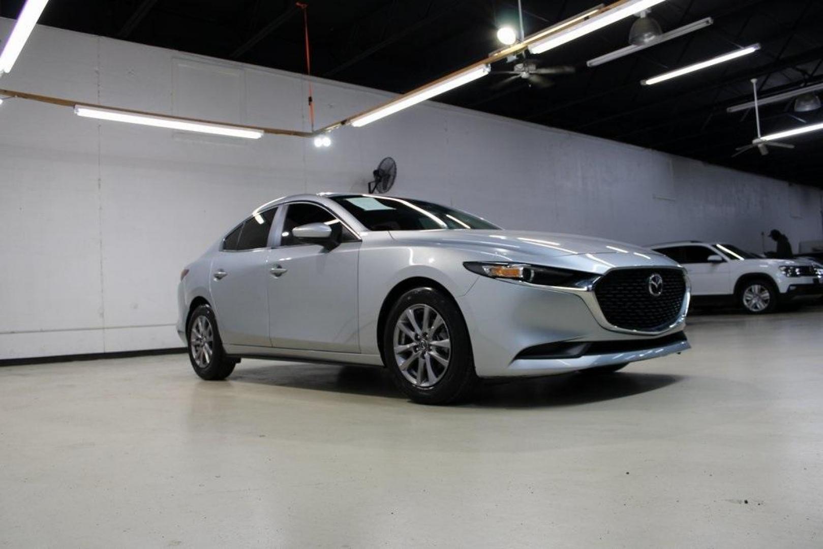 2021 Sonic Silver Metallic /Black Mazda Mazda3 2.0 (3MZBPAA73MM) with an I4 engine, Automatic transmission, located at 15300 Midway Rd., Addison, TX, 75001, (972) 702-0011, 32.958321, -96.838074 - Introducing the 2021 Mazda3 2.5 S Sedan, now available at Midway Auto Group in Addison, Texas. This compact sedan seamlessly blends performance, efficiency, and advanced technology, offering a driving experience that's both exhilarating and practical.<br><br>Key Features:<br><br>Engine: 2.5-liter Sk - Photo#6