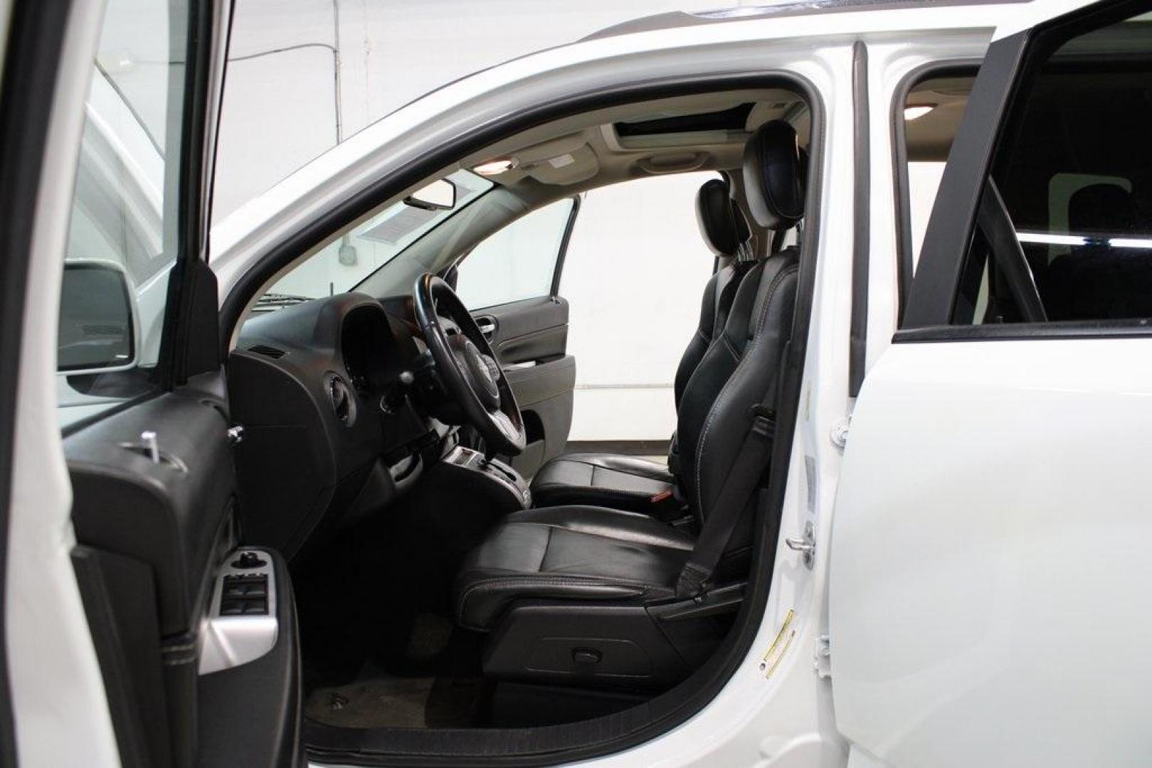 2017 Bright White Clearcoat /Gray Jeep Compass High Altitude (1C4NJDEB5HD) with an 2.4L I4 DOHC 16V Dual VVT engine, Automatic transmission, located at 15300 Midway Rd., Addison, TX, 75001, (972) 702-0011, 32.958321, -96.838074 - Introducing the 2017 Jeep Compass High Altitude, now available at Midway Auto Group in Addison, Texas. With 66,431 miles on the odometer and priced at $12,950, this compact SUV offers a blend of style, comfort, and capability. <br>Edmunds<br>+6<br>midwayautogroup.net<br>+6<br>AutosToday<br>+6<br><br - Photo#11