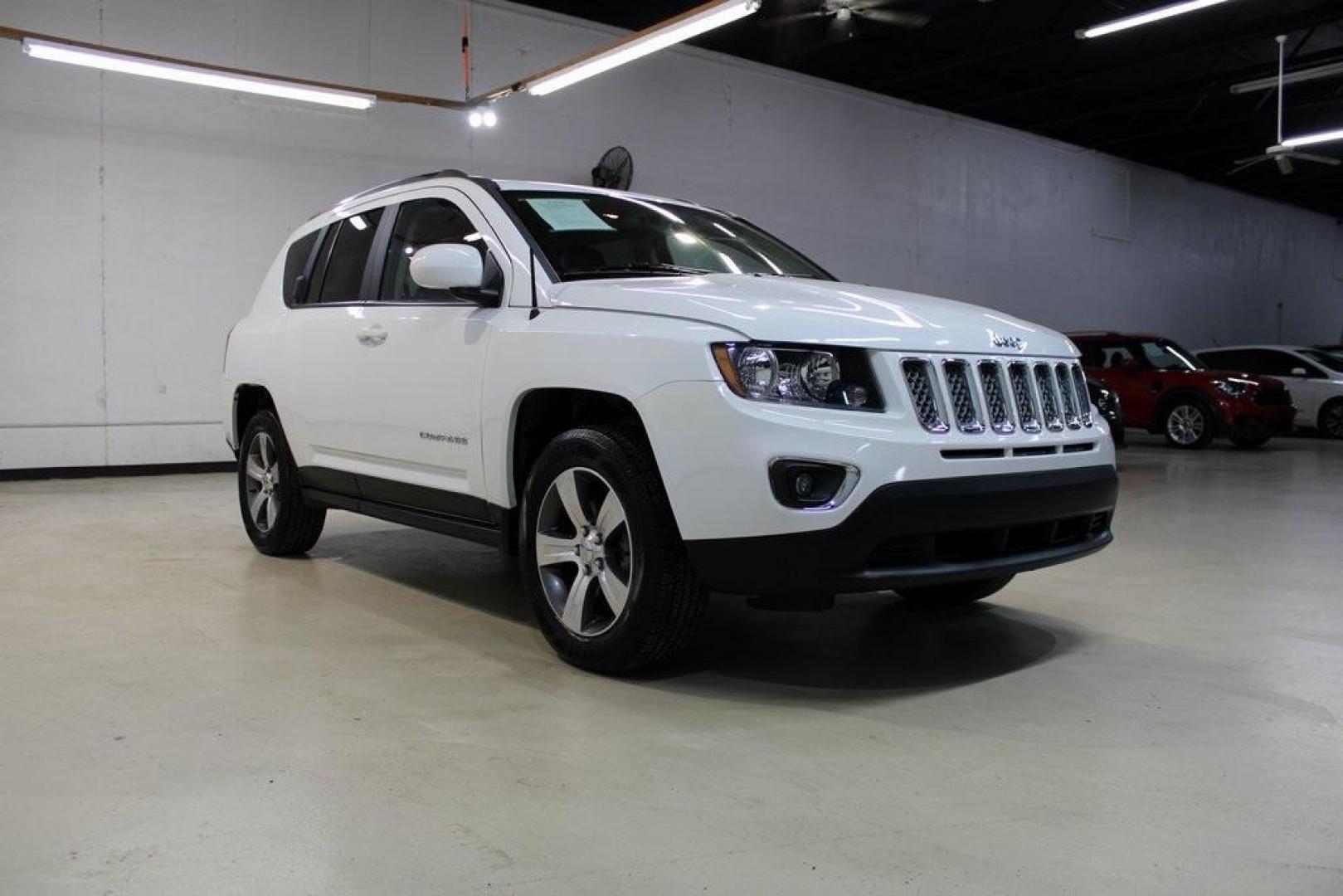 2017 Bright White Clearcoat /Gray Jeep Compass High Altitude (1C4NJDEB5HD) with an 2.4L I4 DOHC 16V Dual VVT engine, Automatic transmission, located at 15300 Midway Rd., Addison, TX, 75001, (972) 702-0011, 32.958321, -96.838074 - Introducing the 2017 Jeep Compass High Altitude, now available at Midway Auto Group in Addison, Texas. With 66,431 miles on the odometer and priced at $12,950, this compact SUV offers a blend of style, comfort, and capability. <br>Edmunds<br>+6<br>midwayautogroup.net<br>+6<br>AutosToday<br>+6<br><br - Photo#1