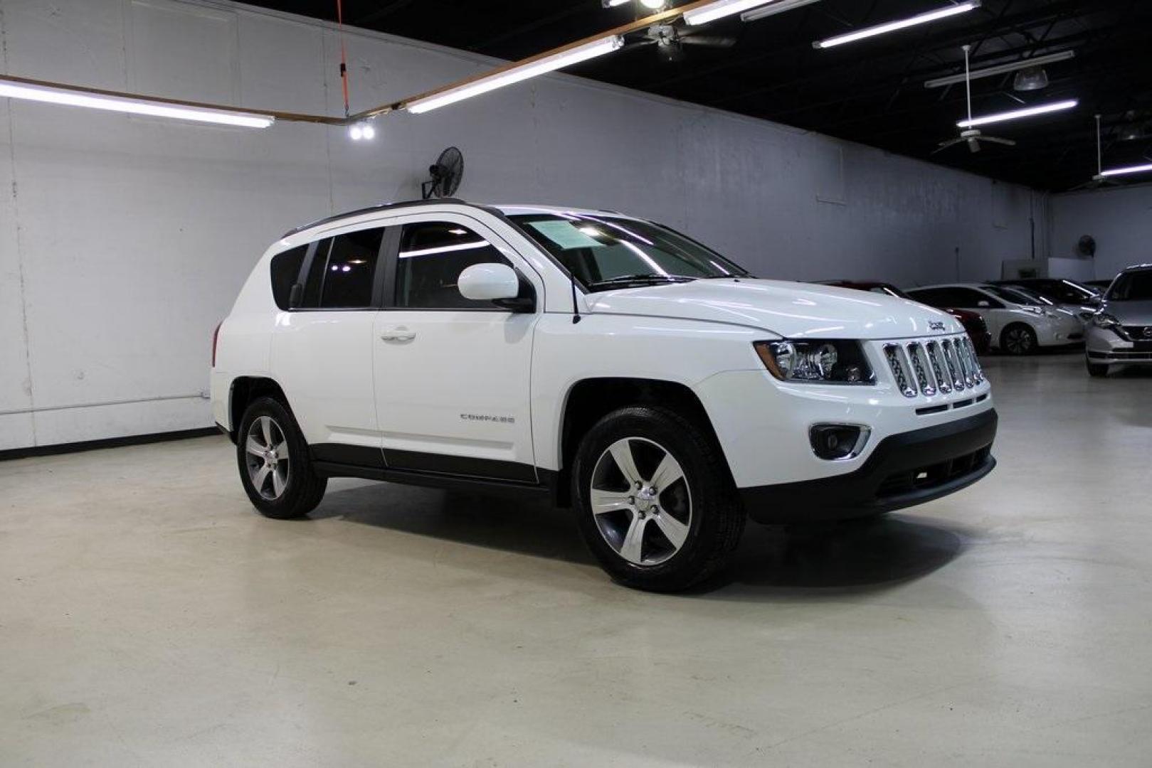 2017 Bright White Clearcoat /Gray Jeep Compass High Altitude (1C4NJDEB5HD) with an 2.4L I4 DOHC 16V Dual VVT engine, Automatic transmission, located at 15300 Midway Rd., Addison, TX, 75001, (972) 702-0011, 32.958321, -96.838074 - Introducing the 2017 Jeep Compass High Altitude, now available at Midway Auto Group in Addison, Texas. With 66,431 miles on the odometer and priced at $12,950, this compact SUV offers a blend of style, comfort, and capability. <br>Edmunds<br>+6<br>midwayautogroup.net<br>+6<br>AutosToday<br>+6<br><br - Photo#4