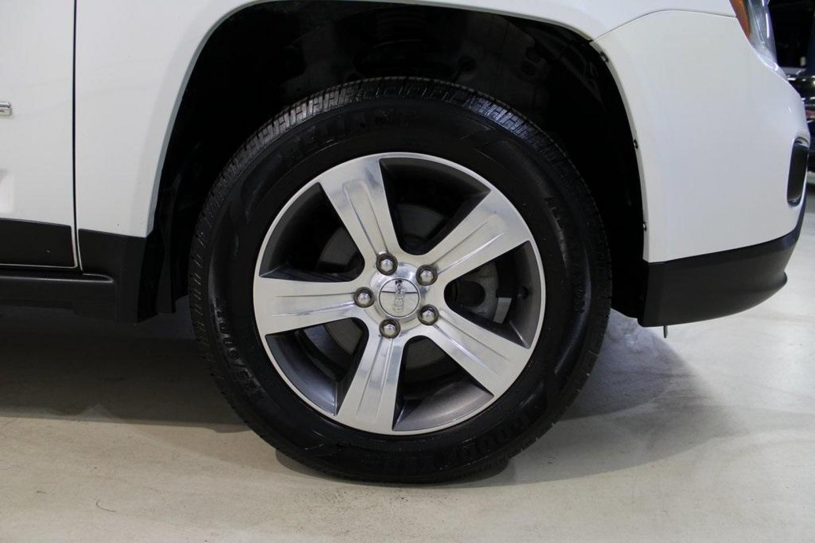 2017 Bright White Clearcoat /Gray Jeep Compass High Altitude (1C4NJDEB5HD) with an 2.4L I4 DOHC 16V Dual VVT engine, Automatic transmission, located at 15300 Midway Rd., Addison, TX, 75001, (972) 702-0011, 32.958321, -96.838074 - Introducing the 2017 Jeep Compass High Altitude, now available at Midway Auto Group in Addison, Texas. With 66,431 miles on the odometer and priced at $12,950, this compact SUV offers a blend of style, comfort, and capability. <br>Edmunds<br>+6<br>midwayautogroup.net<br>+6<br>AutosToday<br>+6<br><br - Photo#8