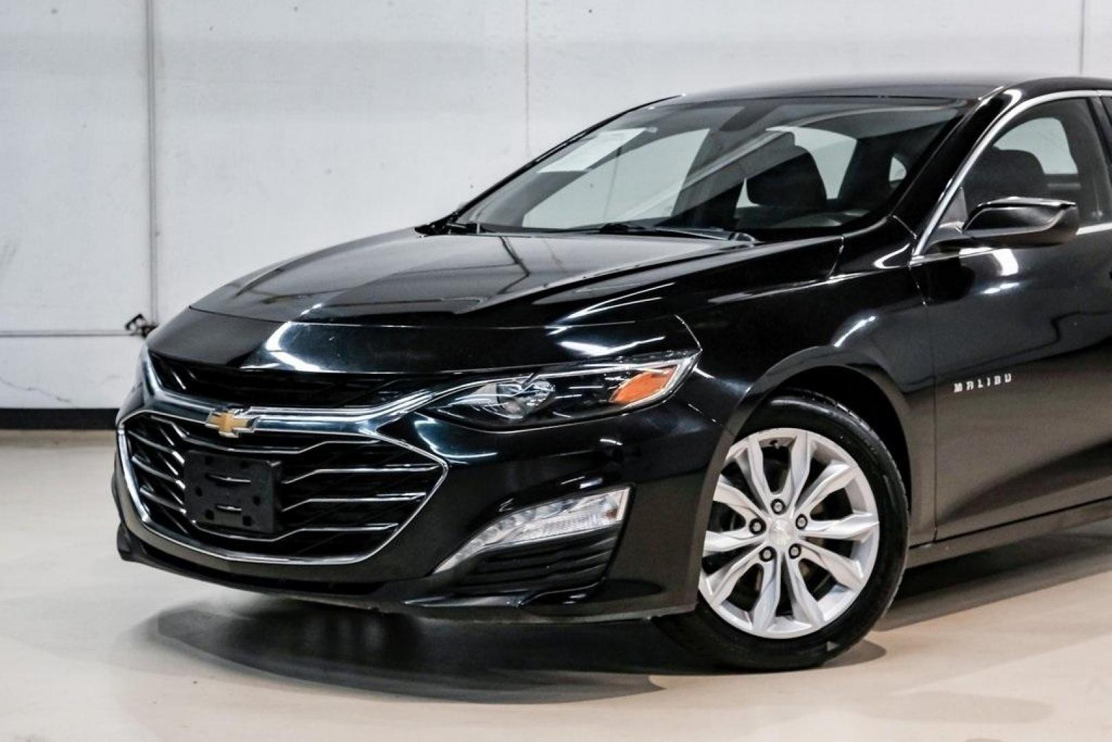 2019 Mosaic Black Metallic /Jet Black Chevrolet Malibu LT (1G1ZD5ST9KF) with an 1.5L DOHC engine, CVT transmission, located at 15300 Midway Rd., Addison, TX, 75001, (972) 702-0011, 32.958321, -96.838074 - 2019 Chevrolet Malibu LT<br><br>Now Available at Midway Auto Group, Addison, Texas<br><br>Stylish, efficient, and packed with modern features the 2019 Chevrolet Malibu LT is a well-rounded midsize sedan designed for comfort and everyday dependability. With a sleek exterior design, smooth ride qualit - Photo#4