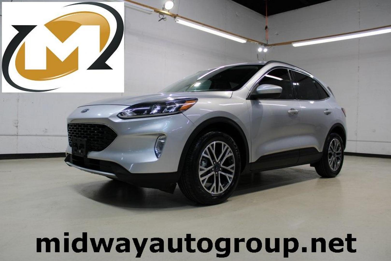 2020 Ingot Silver /Ebony Ford Escape SEL (1FMCU0H66LU) with an 1.5L EcoBoost engine, Automatic transmission, located at 15300 Midway Rd., Addison, TX, 75001, (972) 702-0011, 32.958321, -96.838074 - Photo#0