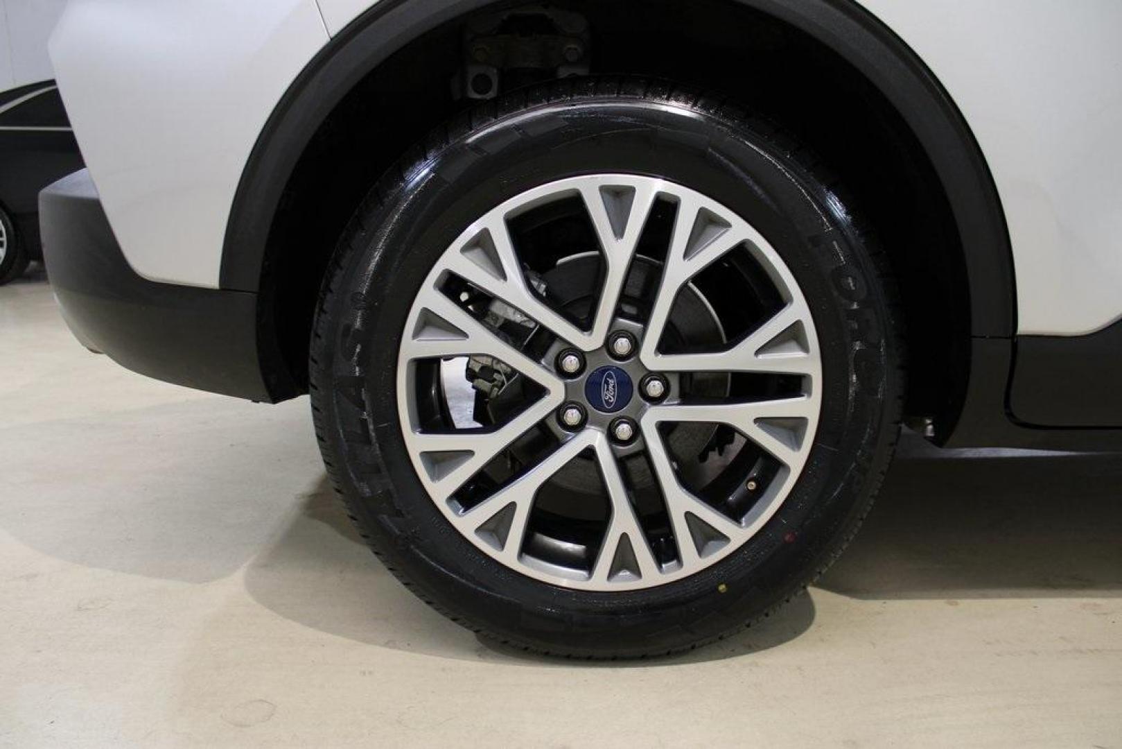 2020 Ingot Silver /Ebony Ford Escape SEL (1FMCU0H66LU) with an 1.5L EcoBoost engine, Automatic transmission, located at 15300 Midway Rd., Addison, TX, 75001, (972) 702-0011, 32.958321, -96.838074 - Photo#10