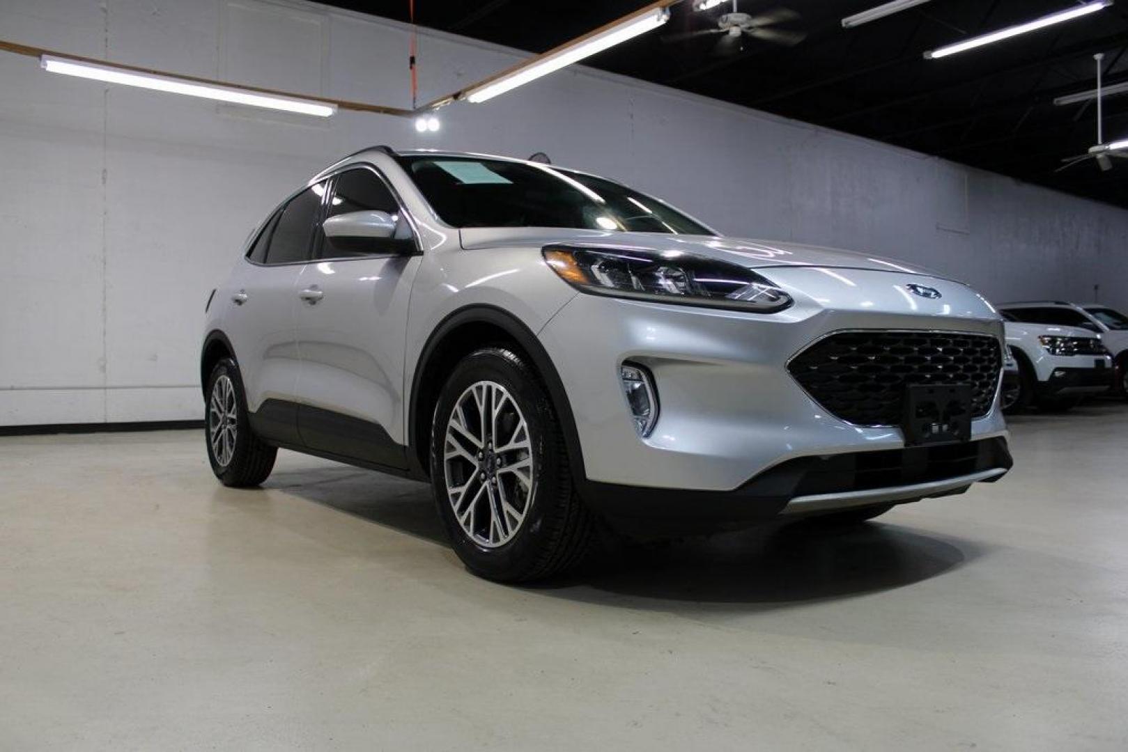 2020 Ingot Silver /Ebony Ford Escape SEL (1FMCU0H66LU) with an 1.5L EcoBoost engine, Automatic transmission, located at 15300 Midway Rd., Addison, TX, 75001, (972) 702-0011, 32.958321, -96.838074 - Photo#1