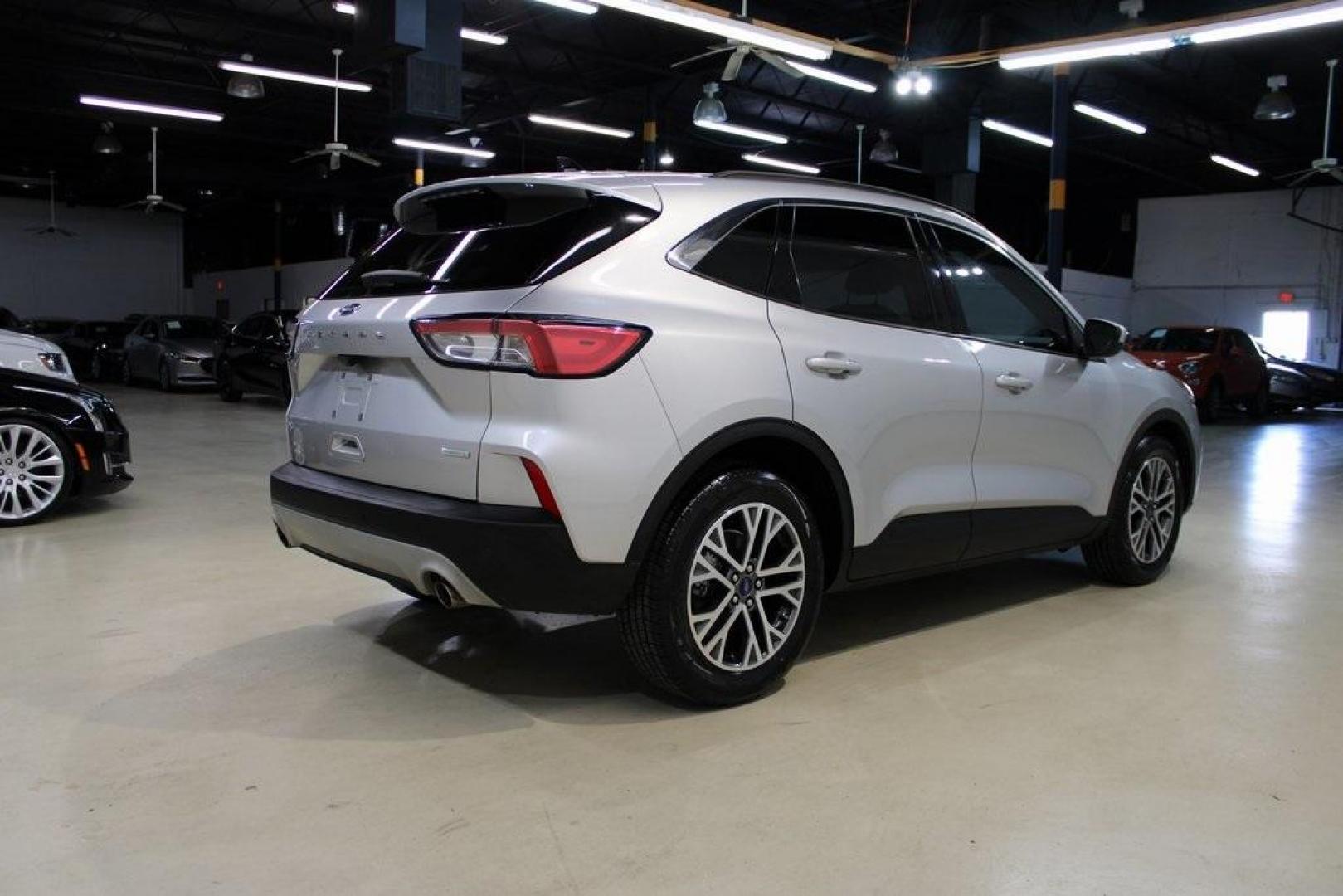2020 Ingot Silver /Ebony Ford Escape SEL (1FMCU0H66LU) with an 1.5L EcoBoost engine, Automatic transmission, located at 15300 Midway Rd., Addison, TX, 75001, (972) 702-0011, 32.958321, -96.838074 - Photo#2