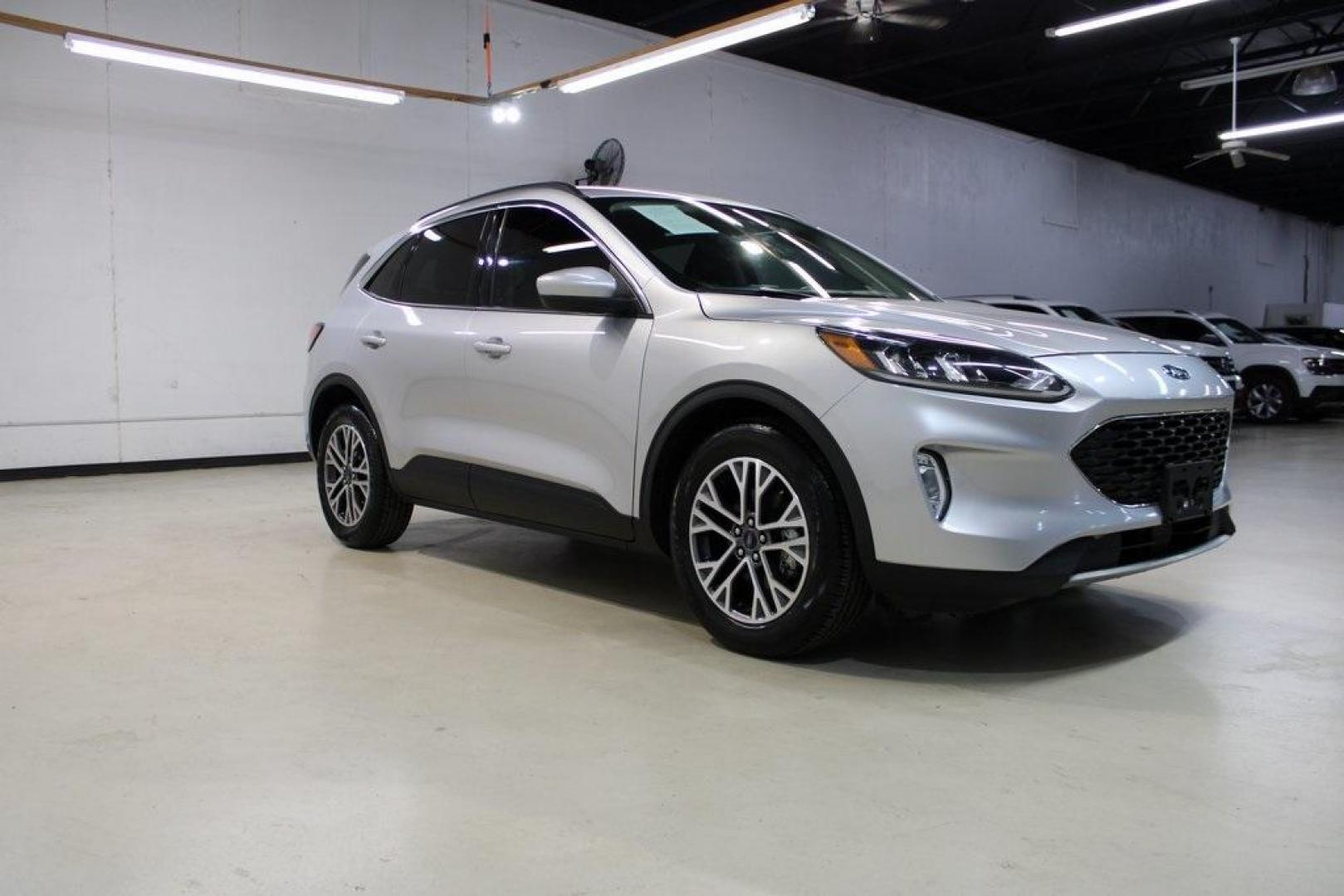 2020 Ingot Silver /Ebony Ford Escape SEL (1FMCU0H66LU) with an 1.5L EcoBoost engine, Automatic transmission, located at 15300 Midway Rd., Addison, TX, 75001, (972) 702-0011, 32.958321, -96.838074 - Photo#6