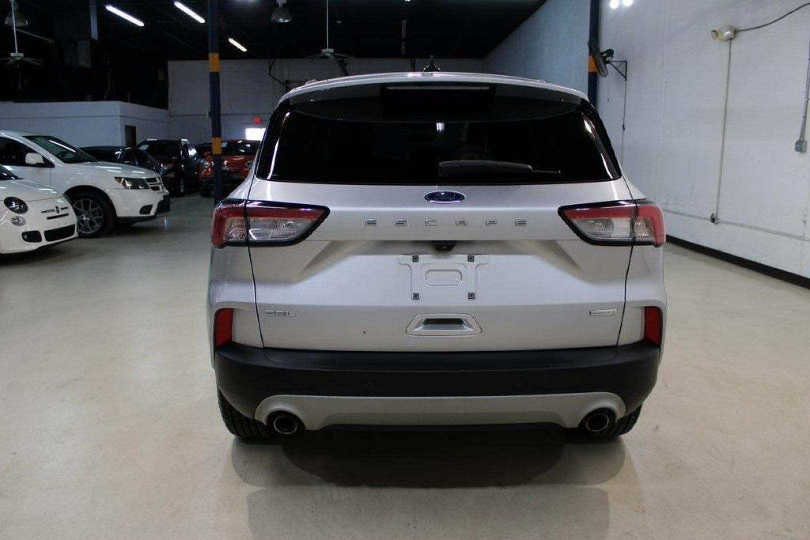 2020 Ingot Silver /Ebony Ford Escape SEL (1FMCU0H66LU) with an 1.5L EcoBoost engine, Automatic transmission, located at 15300 Midway Rd., Addison, TX, 75001, (972) 702-0011, 32.958321, -96.838074 - Photo#7