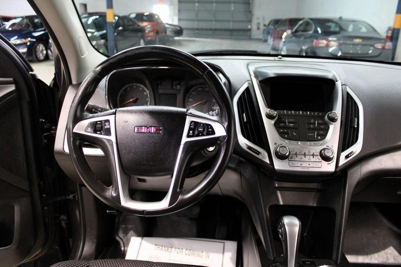 2015 Iridium Metallic /Jet Black GMC Terrain SLE-2 (2GKALREK9F6) with an 2.4L 4-Cylinder SIDI DOHC VVT engine, Automatic transmission, located at 15300 Midway Rd., Addison, TX, 75001, (972) 702-0011, 32.958321, -96.838074 - Introducing the 2015 GMC Terrain SLE-2, now available at Midway Auto Group in Addison, Texas. This versatile SUV has 116,129 miles on the odometer and is priced at $7,950. <br>Autolist<br>+6<br>midwayautogroup.net<br>+6<br>AutosToday<br>+6<br>CarGurus<br>+3<br>midwayautogroup.net<br>+3<br>midwayauto - Photo#17