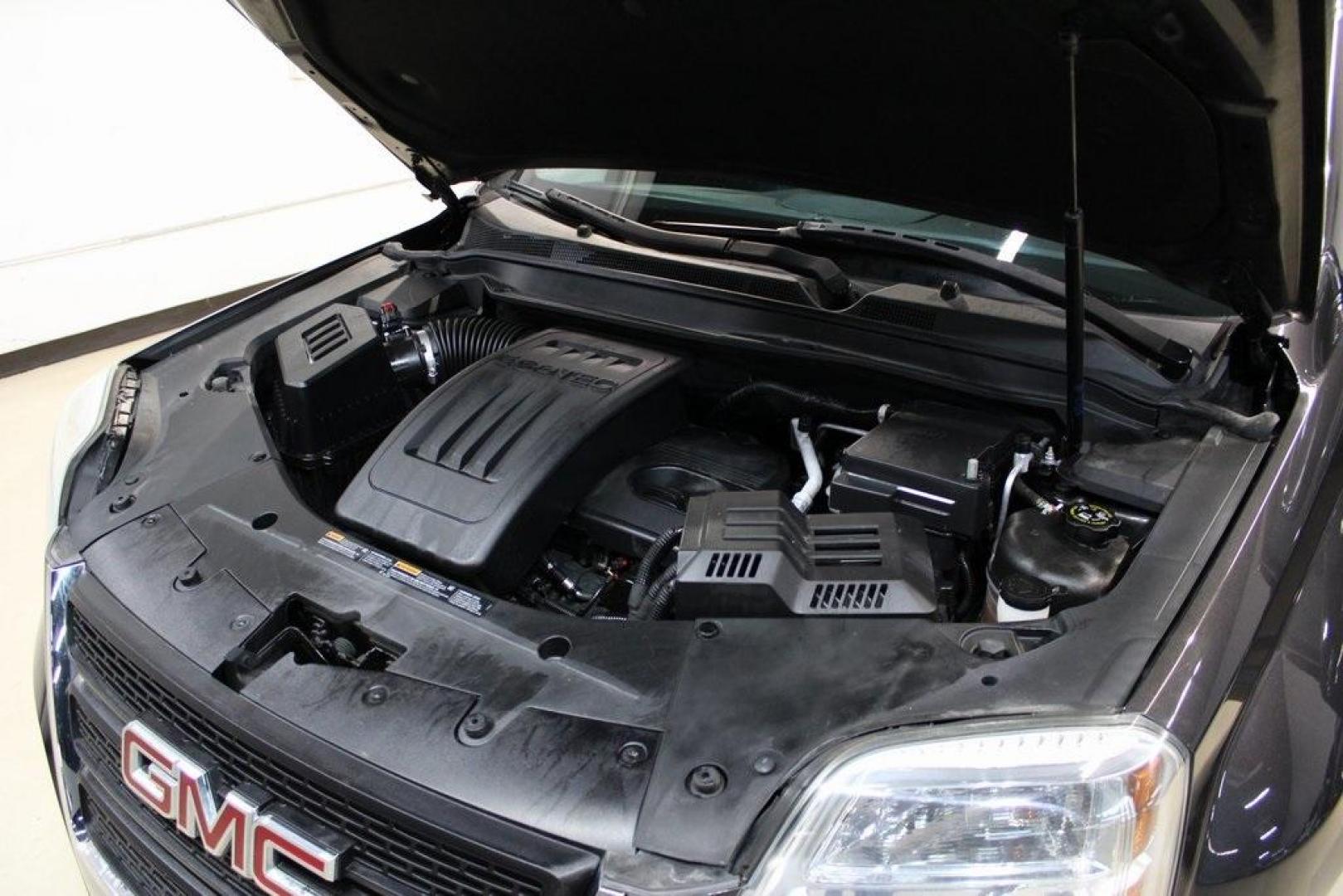2015 Iridium Metallic /Jet Black GMC Terrain SLE-2 (2GKALREK9F6) with an 2.4L 4-Cylinder SIDI DOHC VVT engine, Automatic transmission, located at 15300 Midway Rd., Addison, TX, 75001, (972) 702-0011, 32.958321, -96.838074 - Introducing the 2015 GMC Terrain SLE-2, now available at Midway Auto Group in Addison, Texas. This versatile SUV has 116,129 miles on the odometer and is priced at $7,950. <br>Autolist<br>+6<br>midwayautogroup.net<br>+6<br>AutosToday<br>+6<br>CarGurus<br>+3<br>midwayautogroup.net<br>+3<br>midwayauto - Photo#27