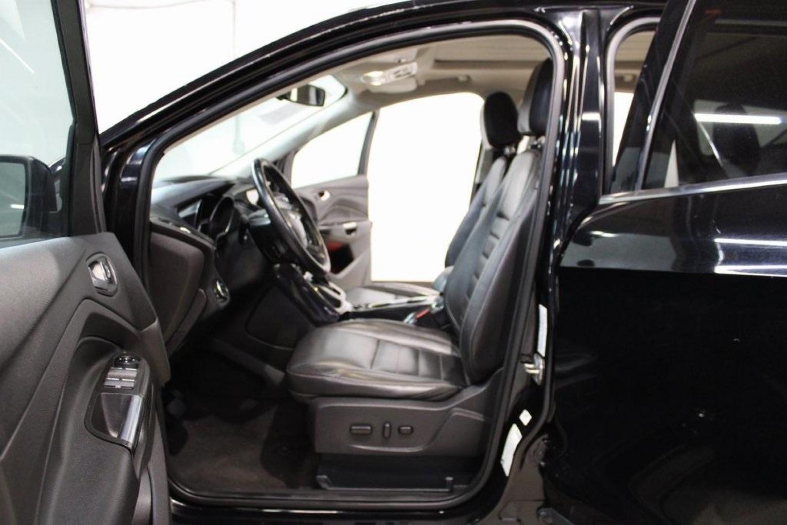 2016 Shadow Black /Black Ford Escape Titanium (1FMCU9J91GU) with an EcoBoost 2.0L I4 GTDi DOHC Turbocharged VCT engine, Automatic transmission, located at 15300 Midway Rd., Addison, TX, 75001, (972) 702-0011, 32.958321, -96.838074 - Introducing the 2016 Ford Escape Titanium, now available at Midway Auto Group in Addison, Texas. With 87,065 miles on the odometer and priced at $11,950, this SUV offers a blend of performance, comfort, and advanced features. <br>midwayautogroup.net<br>+2<br>midwayautogroup.net<br>+2<br>Cruz.com<br> - Photo#13