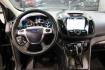 2016 Shadow Black /Black Ford Escape Titanium (1FMCU9J91GU) with an EcoBoost 2.0L I4 GTDi DOHC Turbocharged VCT engine, Automatic transmission, located at 15300 Midway Rd., Addison, TX, 75001, (972) 702-0011, 32.958321, -96.838074 - Introducing the 2016 Ford Escape Titanium, now available at Midway Auto Group in Addison, Texas. With 87,065 miles on the odometer and priced at $11,950, this SUV offers a blend of performance, comfort, and advanced features. <br>midwayautogroup.net<br>+2<br>midwayautogroup.net<br>+2<br>Cruz.com<br> - Photo#17