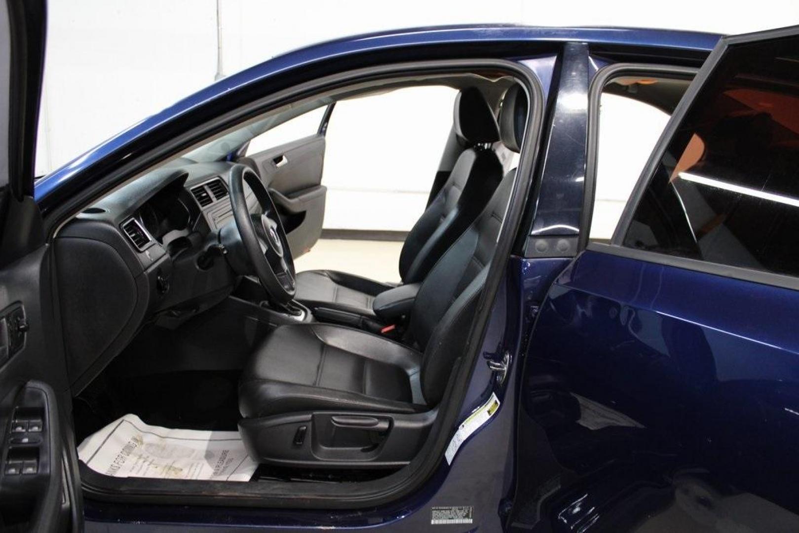 2014 Volkswagen Jetta 1.8T SE (3VWD17AJ3EM) with an 1.8L I4 DOHC engine, Automatic transmission, located at 15300 Midway Rd., Addison, TX, 75001, (972) 702-0011, 32.958321, -96.838074 - Photo#12