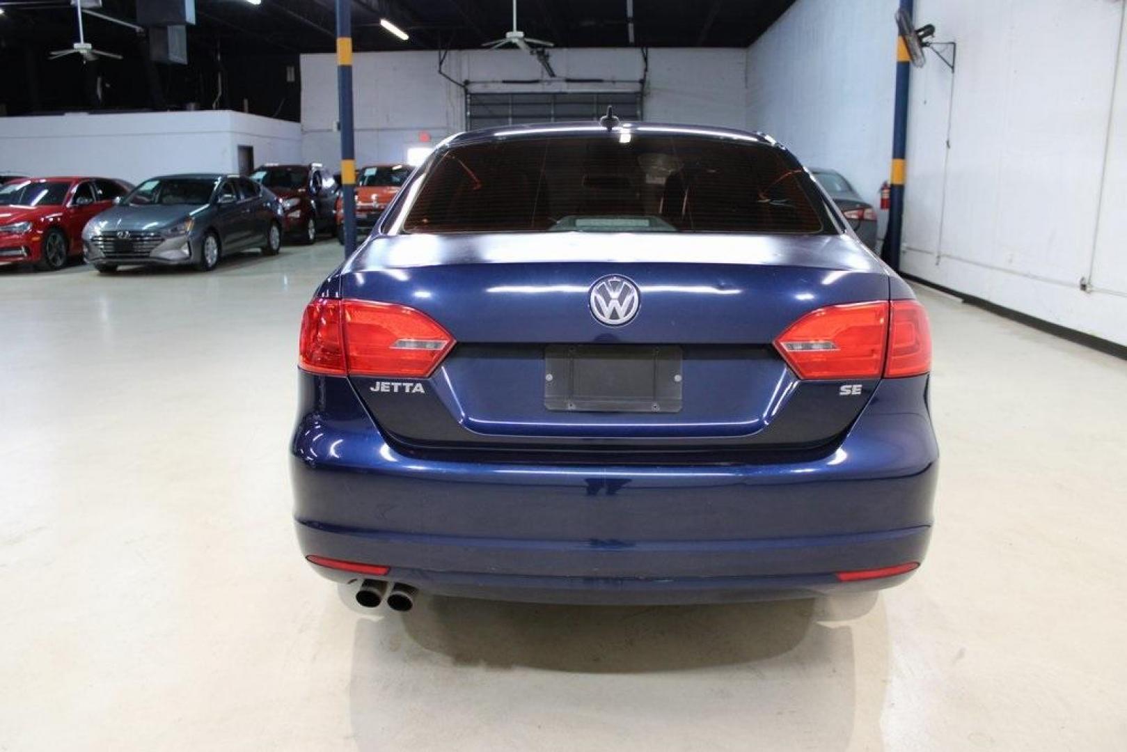 2014 Volkswagen Jetta 1.8T SE (3VWD17AJ3EM) with an 1.8L I4 DOHC engine, Automatic transmission, located at 15300 Midway Rd., Addison, TX, 75001, (972) 702-0011, 32.958321, -96.838074 - Photo#7