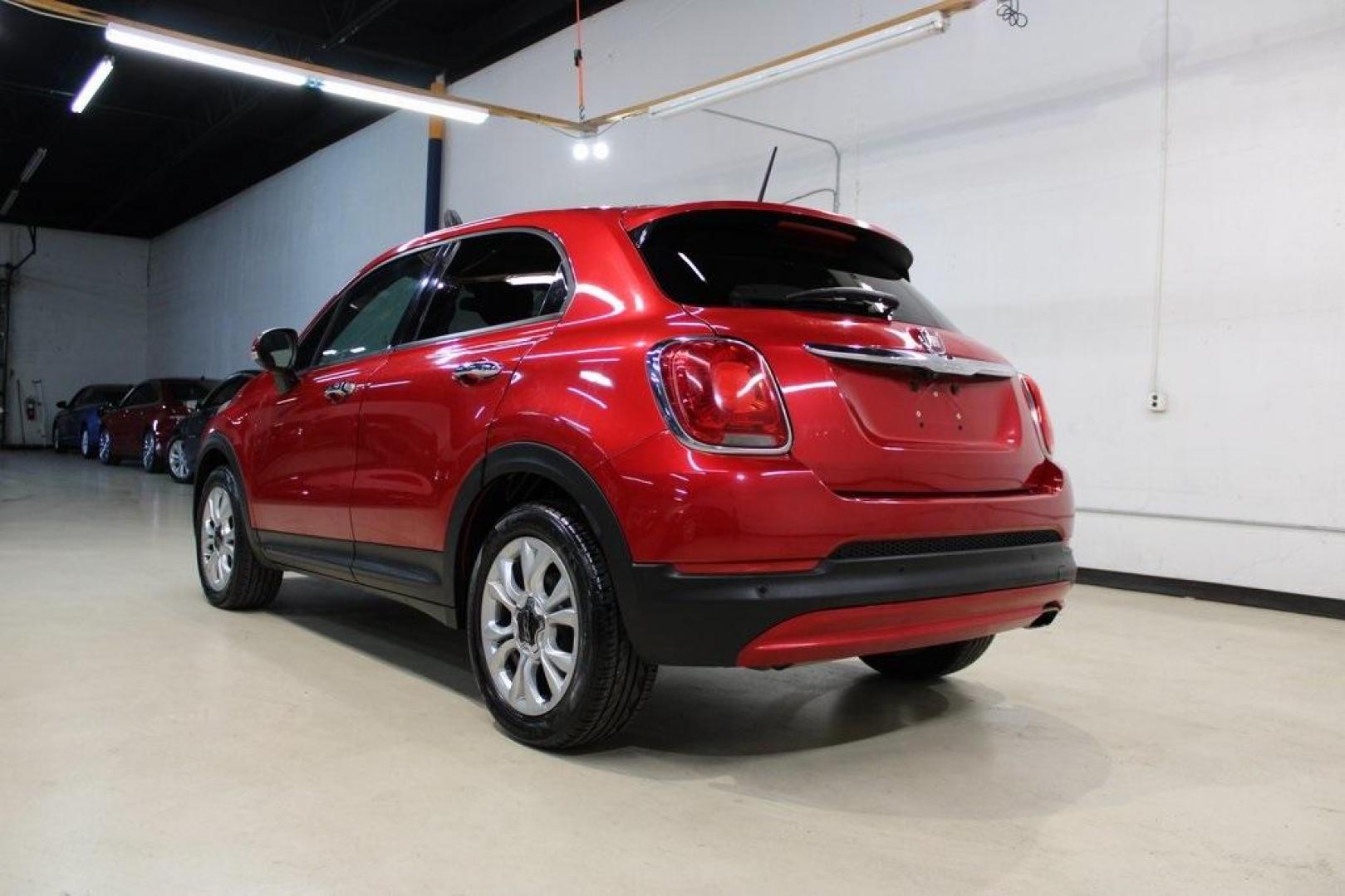2016 Rosso Amore (Red Tri-Coat) /Black/Red Fiat 500X Easy (ZFBCFXBT3GP) with an 2.4L I4 MultiAir engine, Automatic transmission, located at 15300 Midway Rd., Addison, TX, 75001, (972) 702-0011, 32.958321, -96.838074 - Introducing the 2016 Fiat 500X Easy, now available at Midway Auto Group in Addison, Texas. With 83,093 miles on the odometer and priced at $8,950, this compact crossover combines Italian flair with practical functionality. <br><br>Key Features:<br><br>Engine: 1.4L MultiAir Turbocharged I4<br><br>Tra - Photo#3