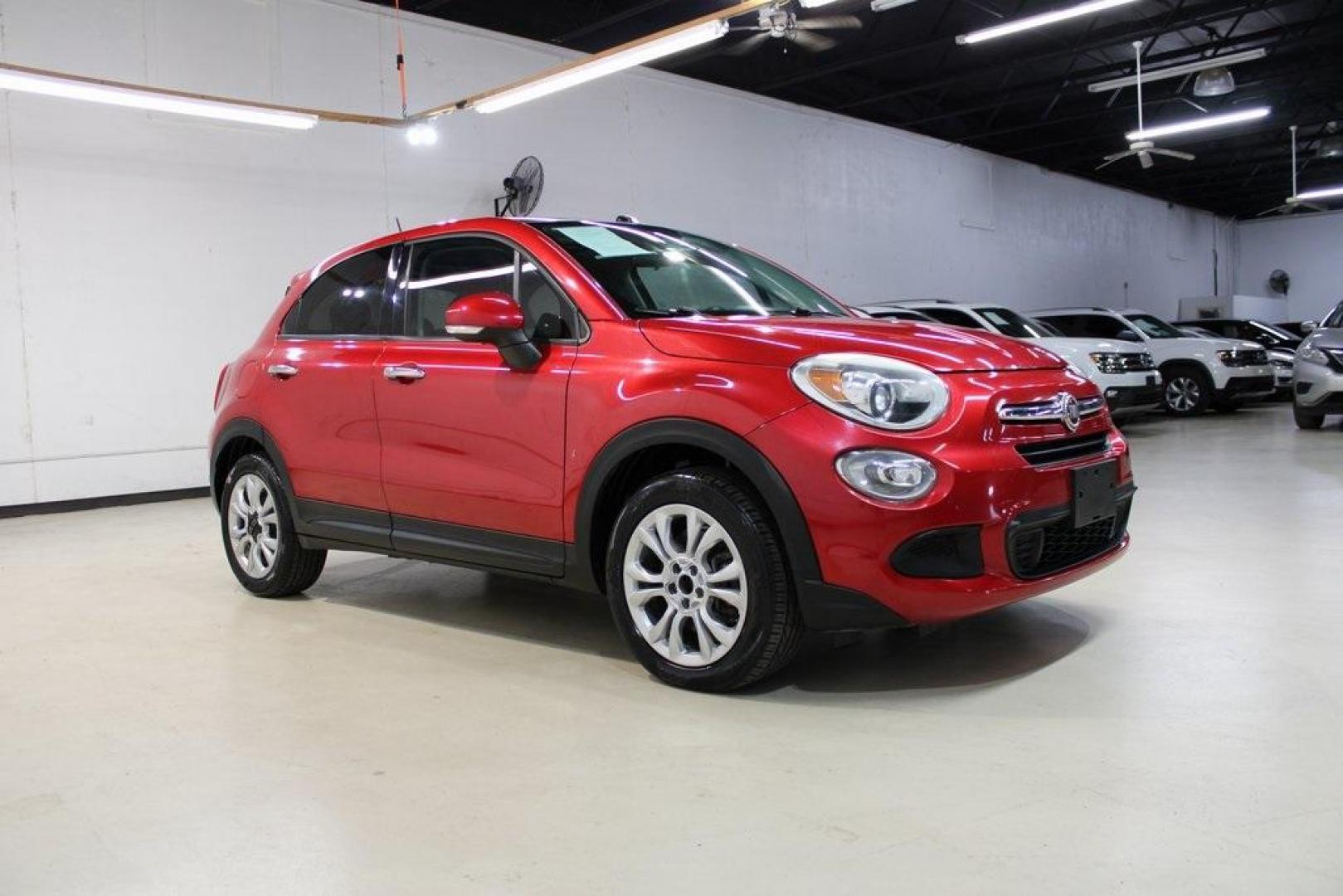 2016 Rosso Amore (Red Tri-Coat) /Black/Red Fiat 500X Easy (ZFBCFXBT3GP) with an 2.4L I4 MultiAir engine, Automatic transmission, located at 15300 Midway Rd., Addison, TX, 75001, (972) 702-0011, 32.958321, -96.838074 - Introducing the 2016 Fiat 500X Easy, now available at Midway Auto Group in Addison, Texas. With 83,093 miles on the odometer and priced at $8,950, this compact crossover combines Italian flair with practical functionality. <br><br>Key Features:<br><br>Engine: 1.4L MultiAir Turbocharged I4<br><br>Tra - Photo#6