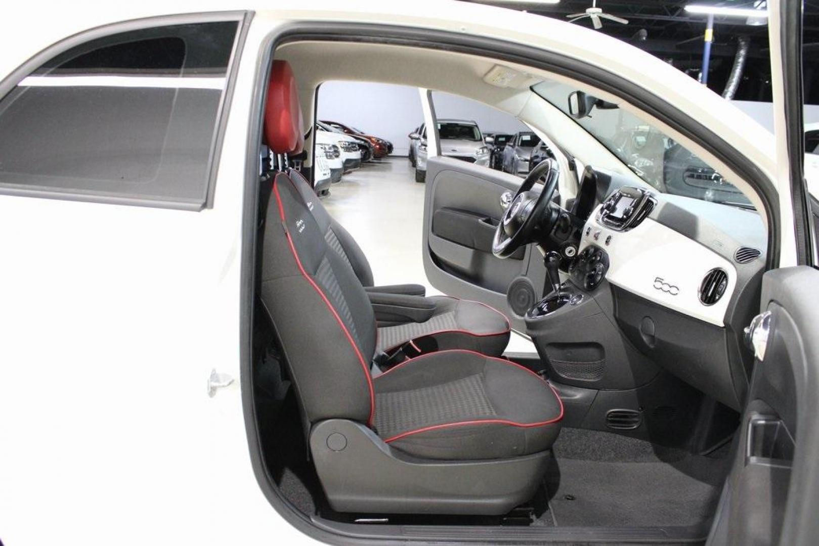2017 Bianco (White) /Nero (Black) Fiat 500 Pop (3C3CFFKR1HT) with an 1.4L I4 16V MultiAir engine, Automatic transmission, located at 15300 Midway Rd., Addison, TX, 75001, (972) 702-0011, 32.958321, -96.838074 - Discover the charm and efficiency of the 2017 Fiat 500 Pop, now available at Midway Auto Group in Addison, Texas. With 68,490 miles on the odometer, this stylish 2-door hatchback offers an engaging driving experience complemented by impressive fuel economy, achieving 27 MPG in the city and 33 MPG on - Photo#14