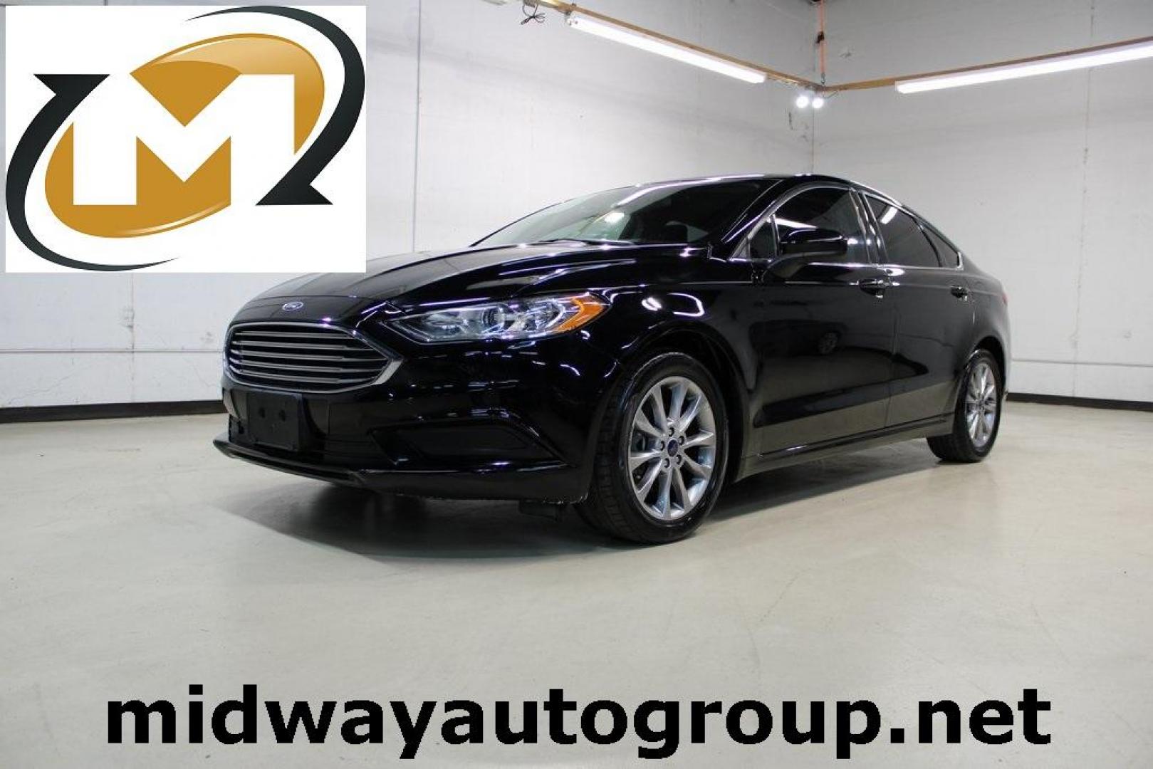 2017 Shadow Black /Ebony Ford Fusion SE (3FA6P0HD6HR) with an 1.5L EcoBoost engine, Automatic transmission, located at 15300 Midway Rd., Addison, TX, 75001, (972) 702-0011, 32.958321, -96.838074 - Stylish, spacious, and built for the road ahead, the 2017 Ford Fusion SE delivers a perfect balance of performance, technology, and comfort. With its sleek design and turbocharged efficiency, this midsize sedan is an outstanding value for anyone looking for a reliable daily driver or a comfortable h - Photo#0