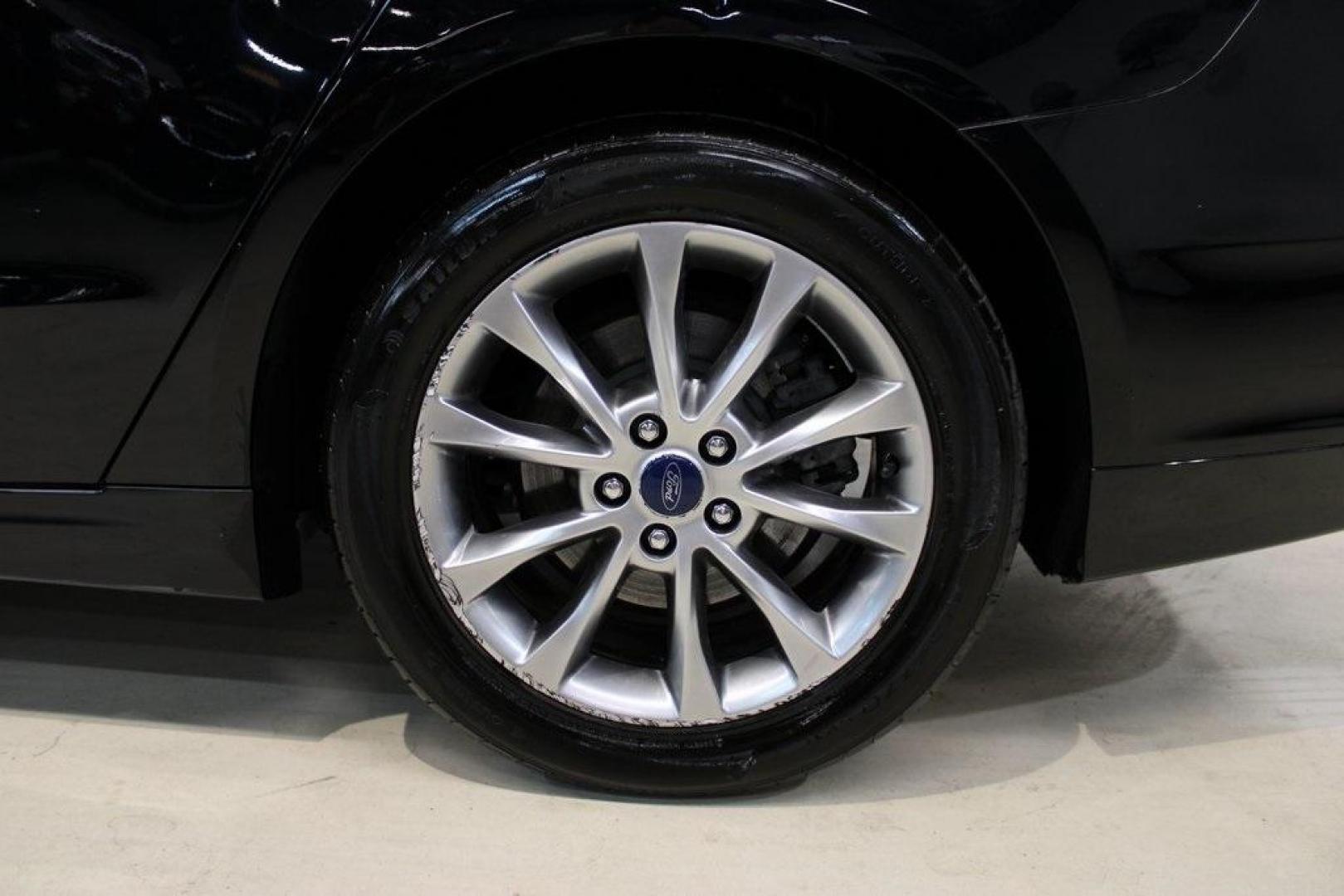 2017 Shadow Black /Ebony Ford Fusion SE (3FA6P0HD6HR) with an 1.5L EcoBoost engine, Automatic transmission, located at 15300 Midway Rd., Addison, TX, 75001, (972) 702-0011, 32.958321, -96.838074 - Stylish, spacious, and built for the road ahead, the 2017 Ford Fusion SE delivers a perfect balance of performance, technology, and comfort. With its sleek design and turbocharged efficiency, this midsize sedan is an outstanding value for anyone looking for a reliable daily driver or a comfortable h - Photo#9