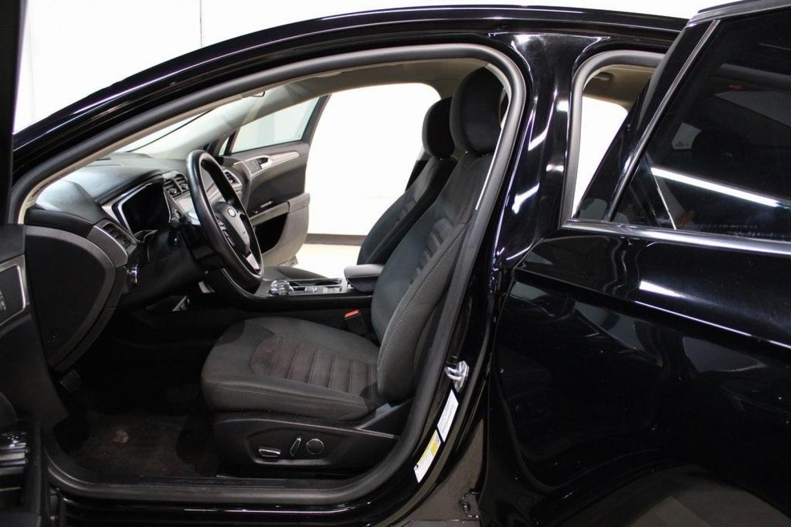 2017 Shadow Black /Ebony Ford Fusion SE (3FA6P0HD6HR) with an 1.5L EcoBoost engine, Automatic transmission, located at 15300 Midway Rd., Addison, TX, 75001, (972) 702-0011, 32.958321, -96.838074 - Stylish, spacious, and built for the road ahead, the 2017 Ford Fusion SE delivers a perfect balance of performance, technology, and comfort. With its sleek design and turbocharged efficiency, this midsize sedan is an outstanding value for anyone looking for a reliable daily driver or a comfortable h - Photo#13