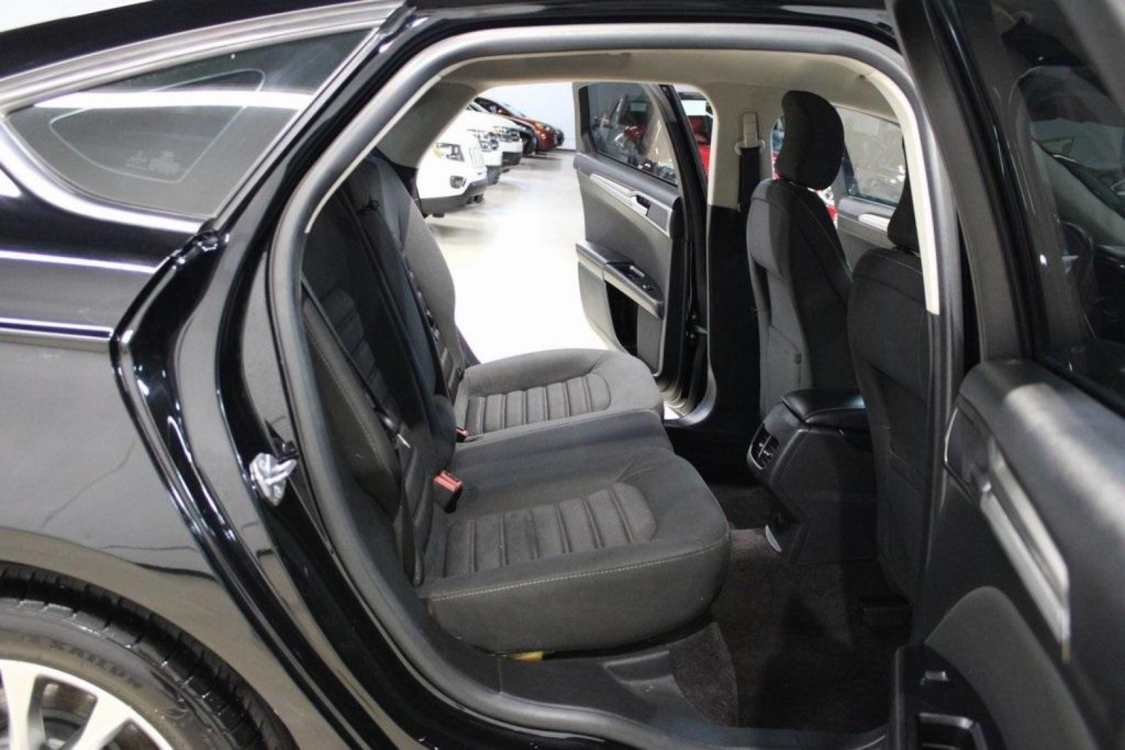 2017 Shadow Black /Ebony Ford Fusion SE (3FA6P0HD6HR) with an 1.5L EcoBoost engine, Automatic transmission, located at 15300 Midway Rd., Addison, TX, 75001, (972) 702-0011, 32.958321, -96.838074 - Stylish, spacious, and built for the road ahead, the 2017 Ford Fusion SE delivers a perfect balance of performance, technology, and comfort. With its sleek design and turbocharged efficiency, this midsize sedan is an outstanding value for anyone looking for a reliable daily driver or a comfortable h - Photo#15