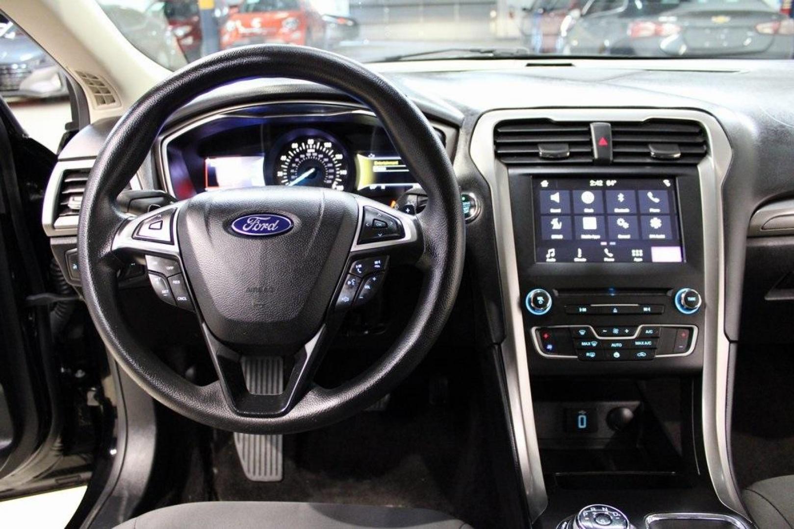 2017 Shadow Black /Ebony Ford Fusion SE (3FA6P0HD6HR) with an 1.5L EcoBoost engine, Automatic transmission, located at 15300 Midway Rd., Addison, TX, 75001, (972) 702-0011, 32.958321, -96.838074 - Stylish, spacious, and built for the road ahead, the 2017 Ford Fusion SE delivers a perfect balance of performance, technology, and comfort. With its sleek design and turbocharged efficiency, this midsize sedan is an outstanding value for anyone looking for a reliable daily driver or a comfortable h - Photo#17